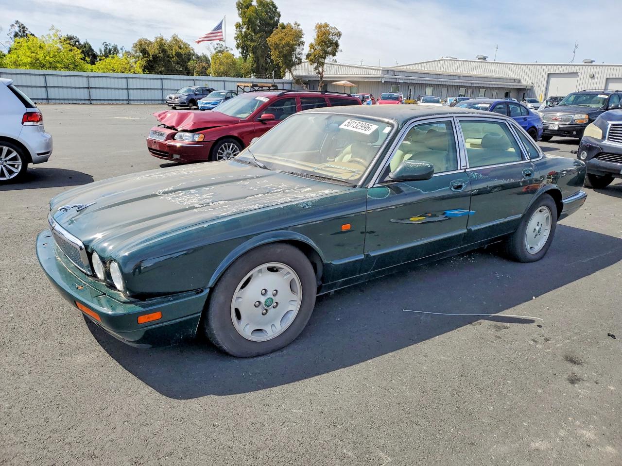 1995 Jaguar XJ, VIN SAJHX1741SC750264 — Minor dents and scratches