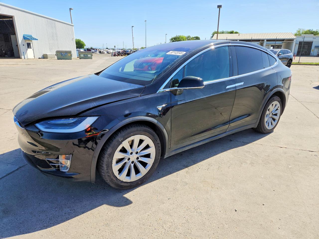 2019 Tesla Model X 75D, VIN 5YJXCAE27KF211593 — Rear end
