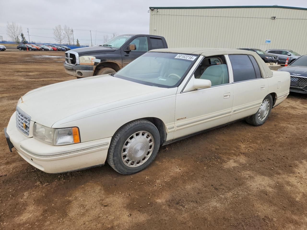 1997 Cadillac DeVille, VIN 1G6KD52YXVU218172 — Бок