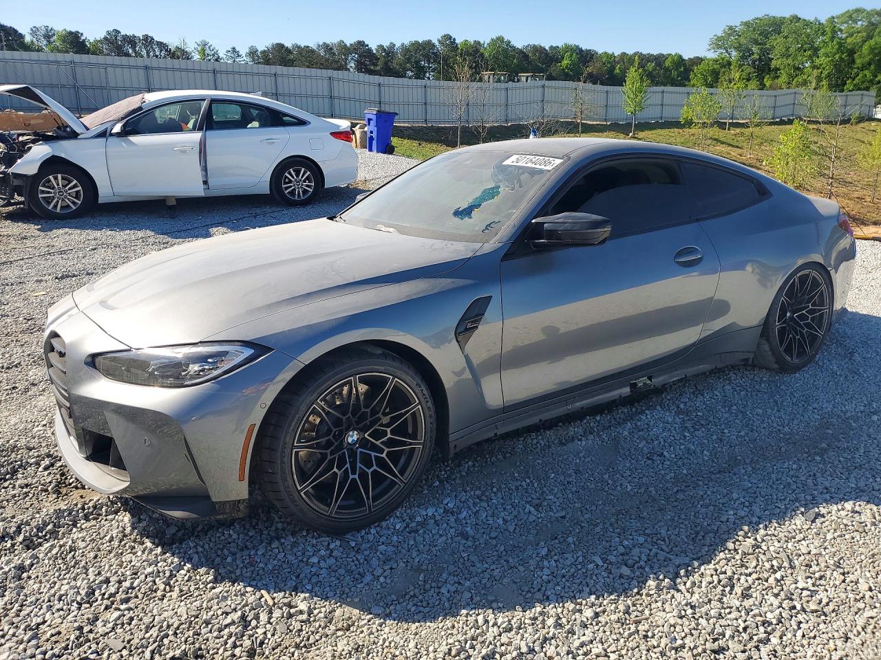 2022 BMW M4 Competition, VIN WBS33AZ08NCH76858 — Rear end