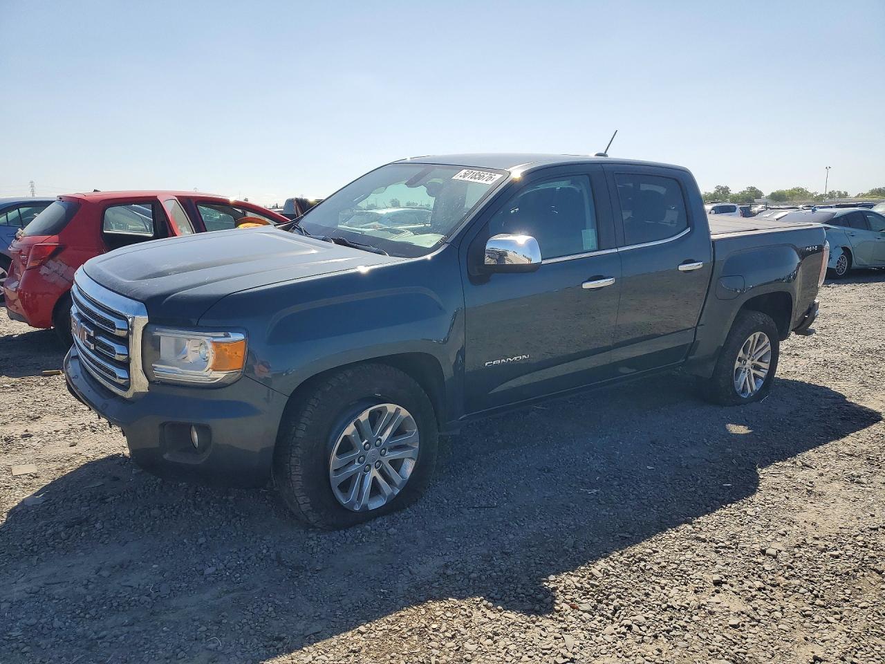 2018 GMC Canyon 4WD SLT, VIN 1GTG6DEN7J1250002 — Rollover