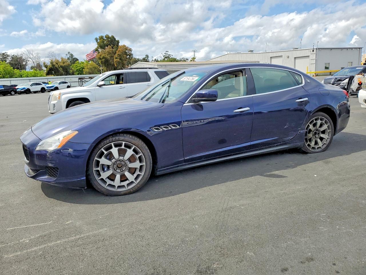 2014 Maserati Quattroporte S Q4, VIN ZAM56RRA5E1082633 — Бок