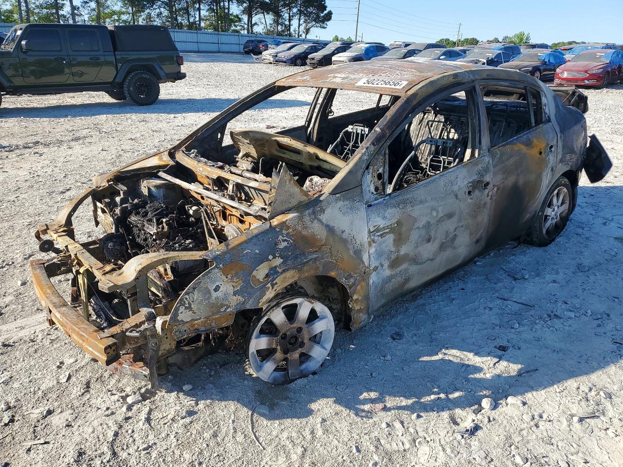 2010 Nissan Sentra SR, VIN 3N1AB6AP4AL719272 — Burn