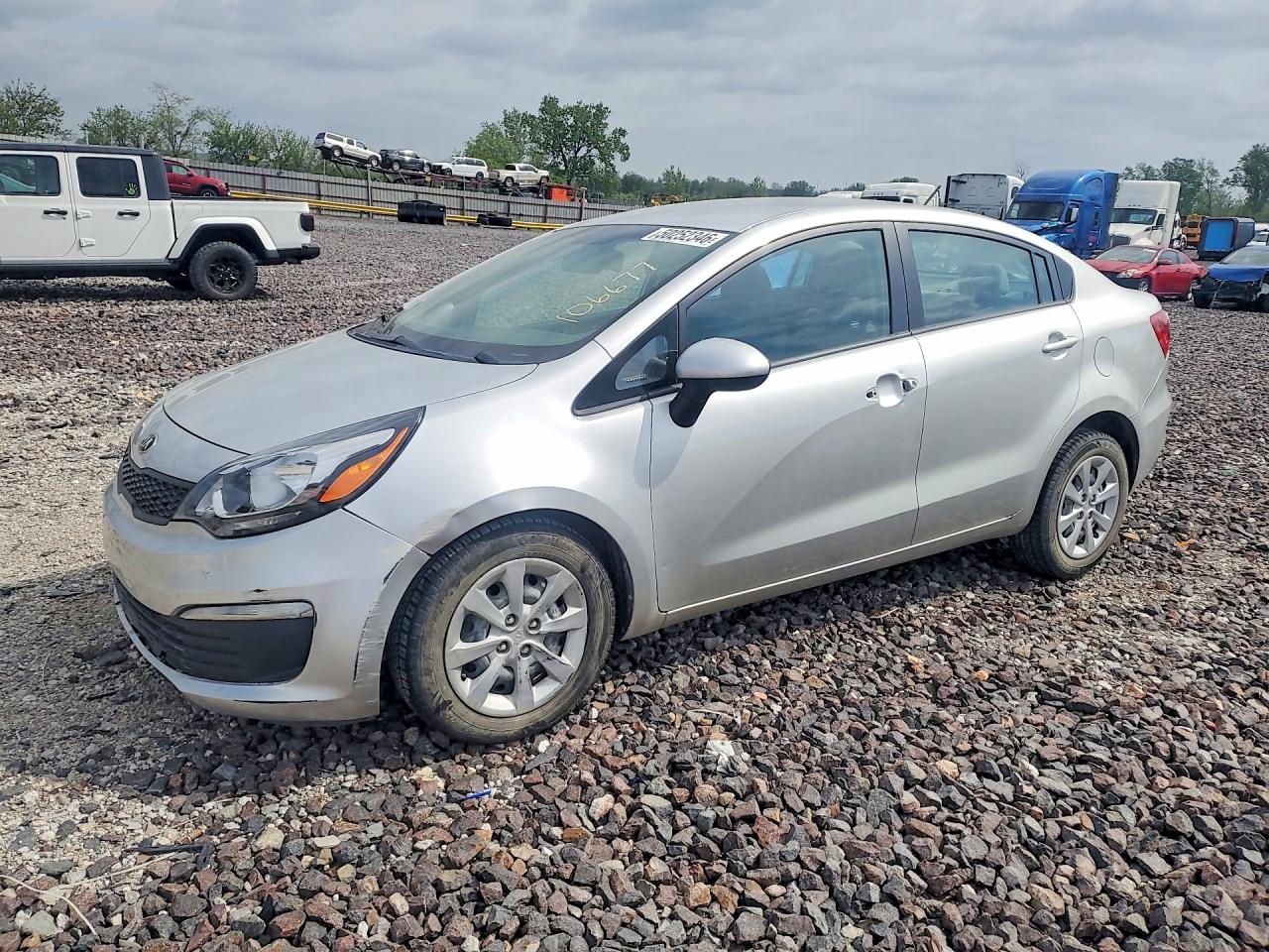 2017 Kia Rio LX, VIN KNADM4A31H6106677 — Бок