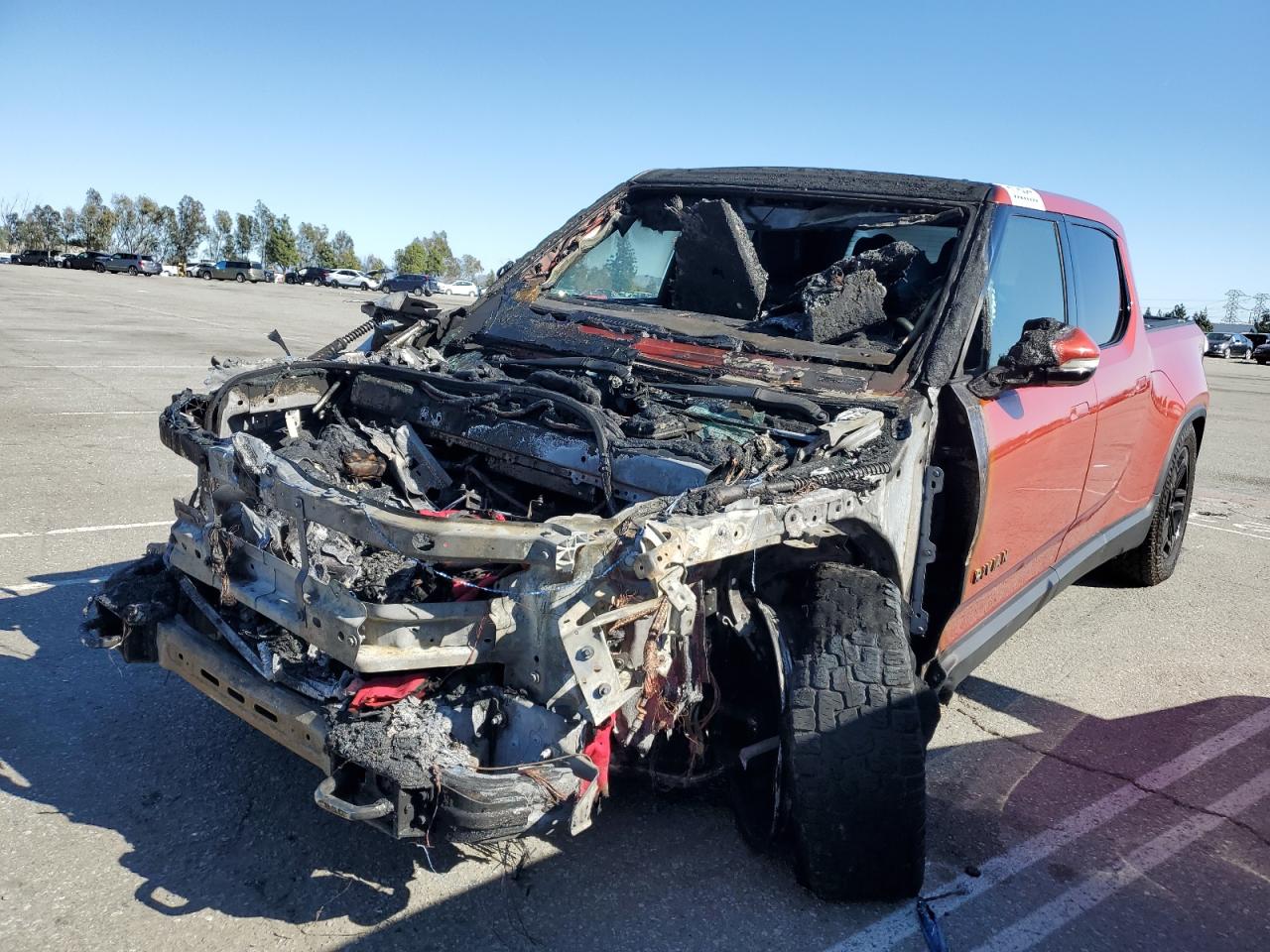 2023 Rivian R1T Adventure, VIN 7FCTGAAA0PN024599 — Burn