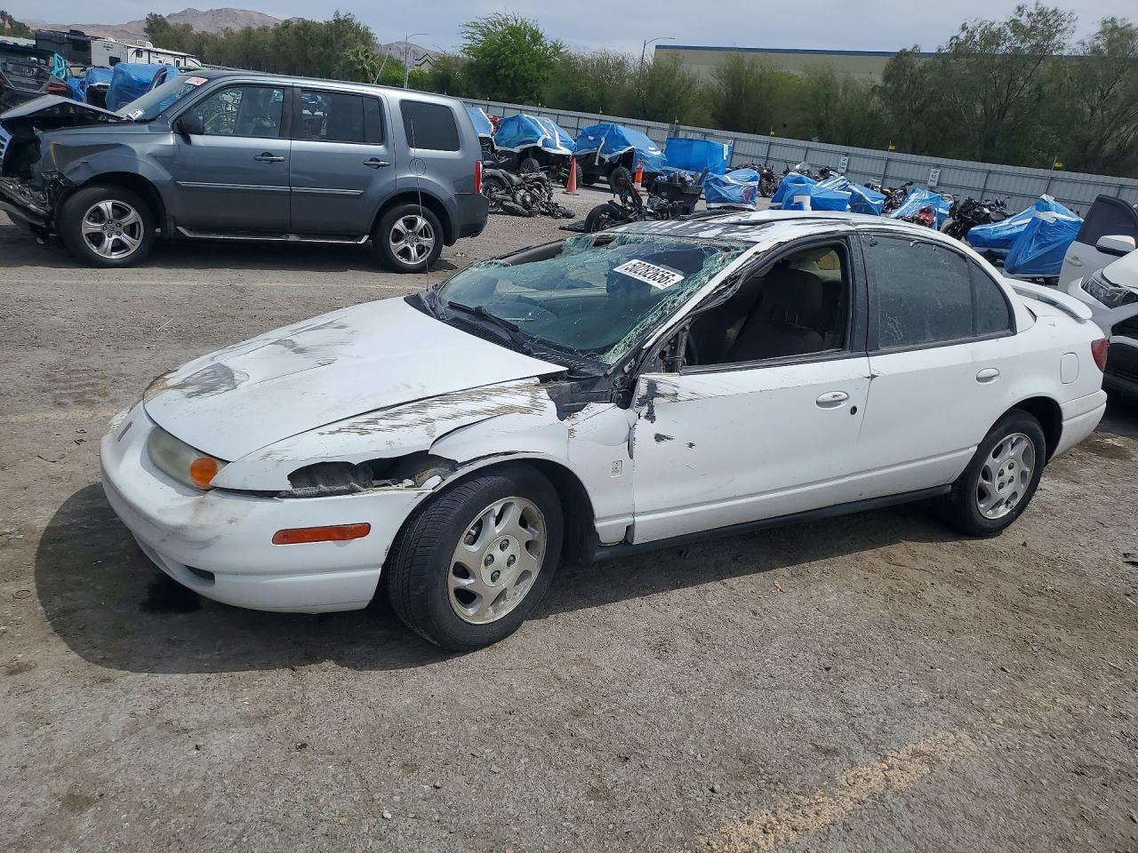 2002 Saturn SL, VIN 1G8ZK54772Z109568 — All over