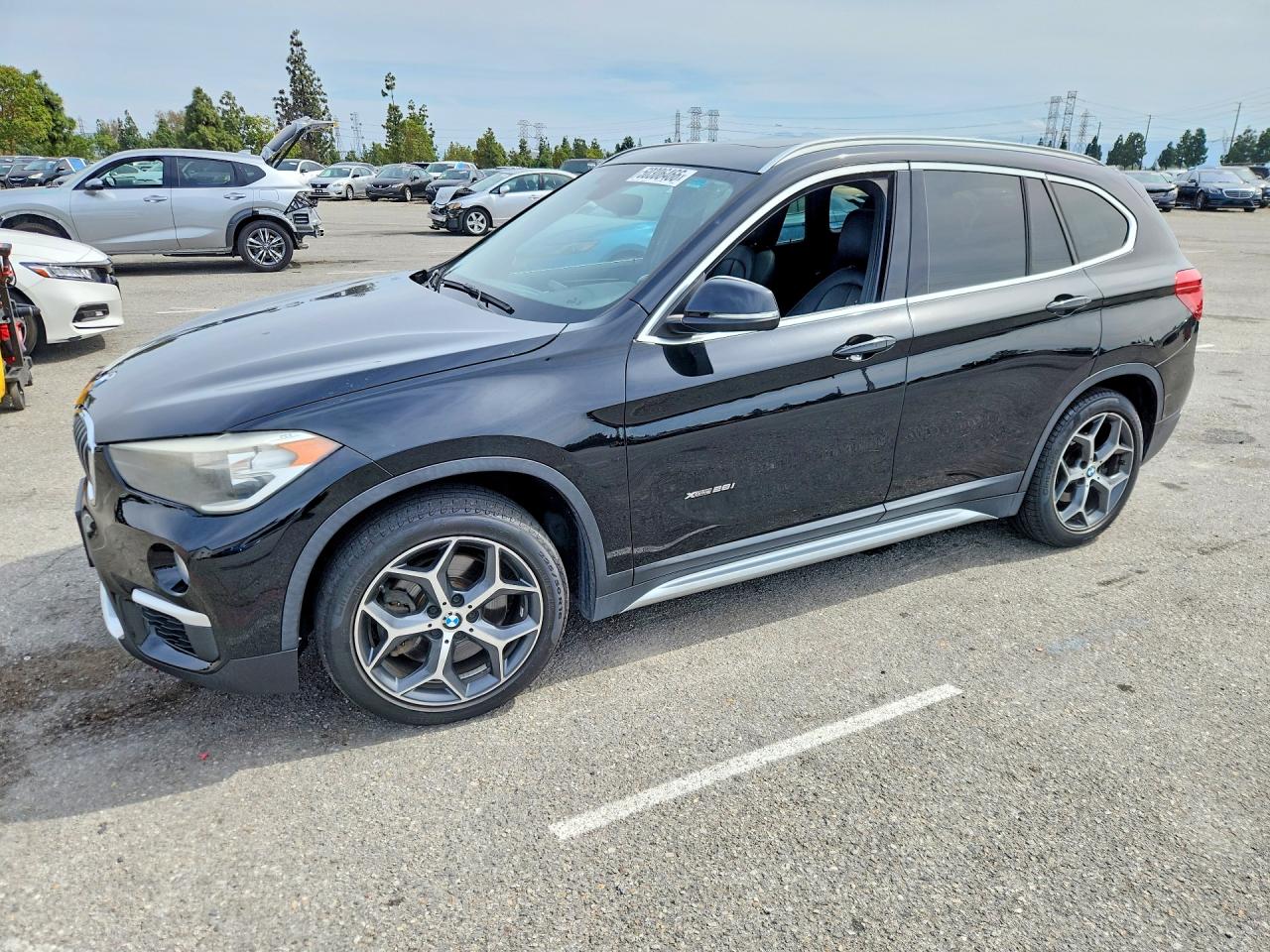 2016 BMW X1 xDrive28i, VIN WBXHT3C36GP880188 — Normal wear