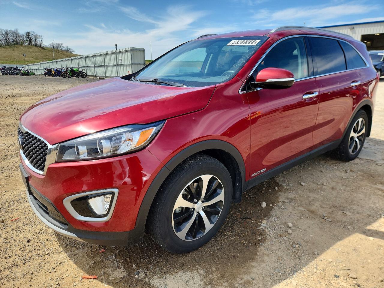 2016 Kia Sorento EX, VIN 5XYPHDA5XGG021094 — Hail