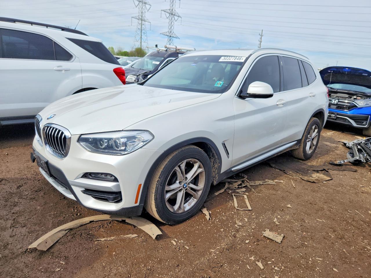 2021 BMW X3 xDrive30i, VIN 5UXTY5C03M9H02721 — Side