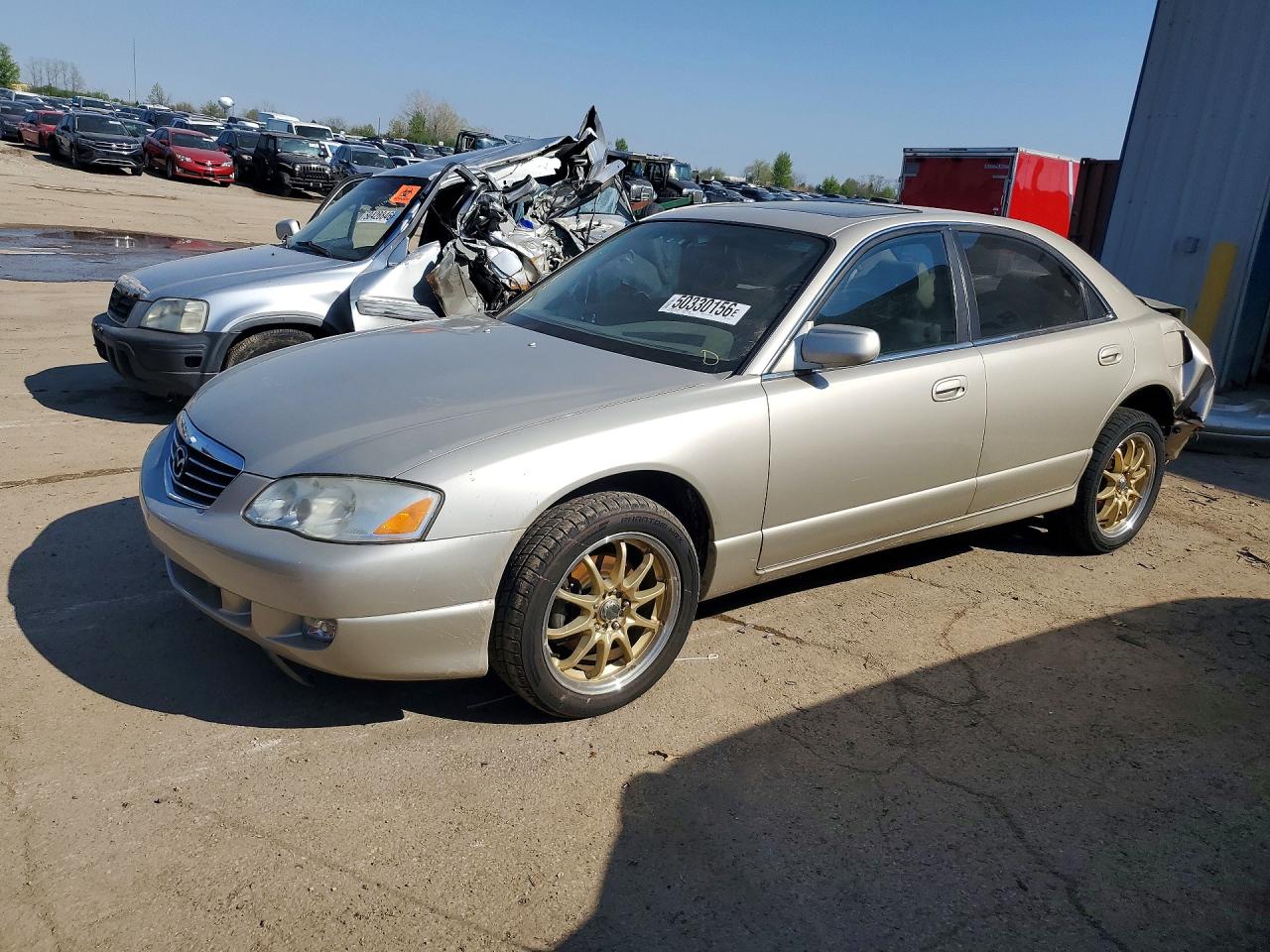2002 Mazda Millenia S, VIN JM1TA222921719717 — Rear end