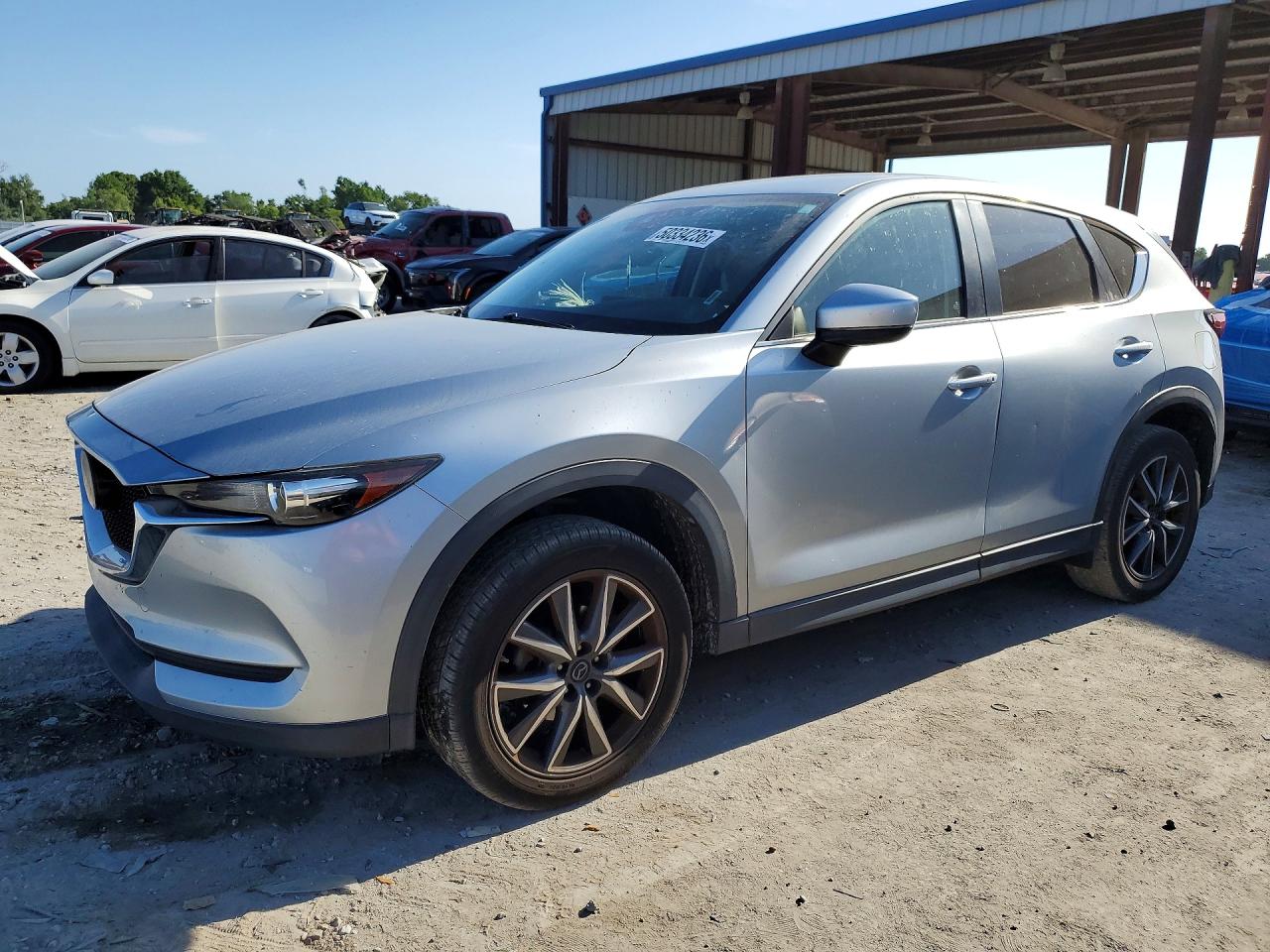 2018 Mazda CX-5 Touring, VIN JM3KFACM0J0335540 — Бок