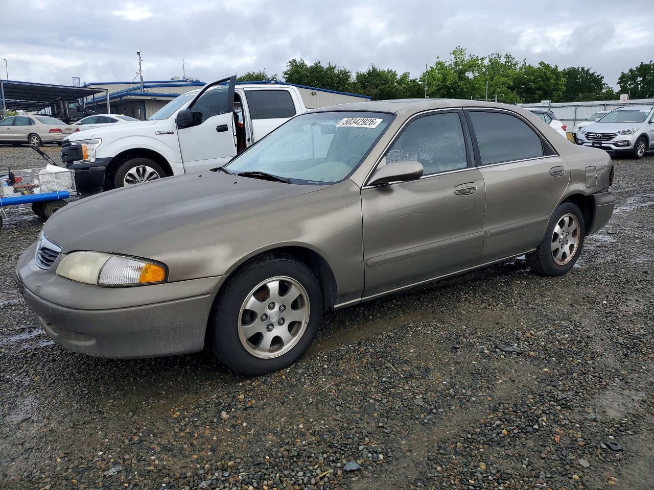 1999 Mazda 626 ES, VIN 1YVGF22C9X5880008 — Rear end