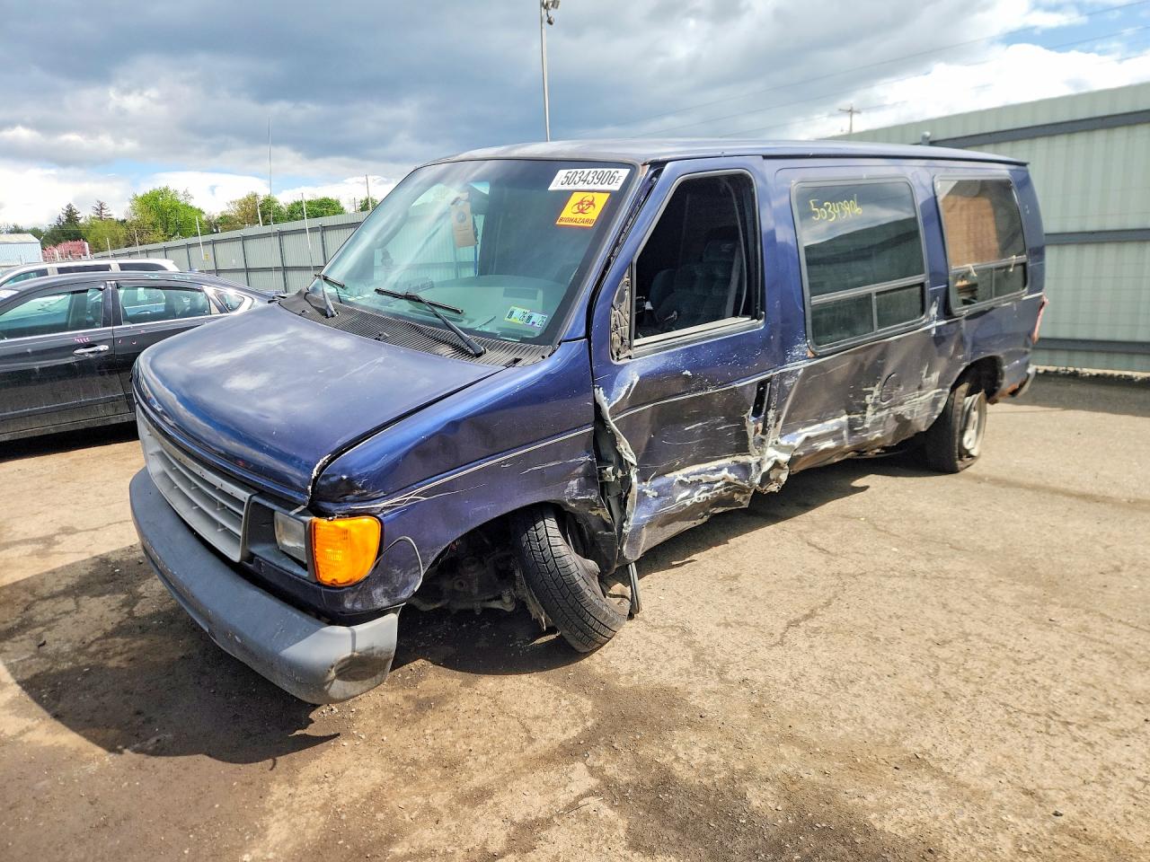 1996 Ford Econoline, VIN 1FTFE24Y1THA12736 — Side