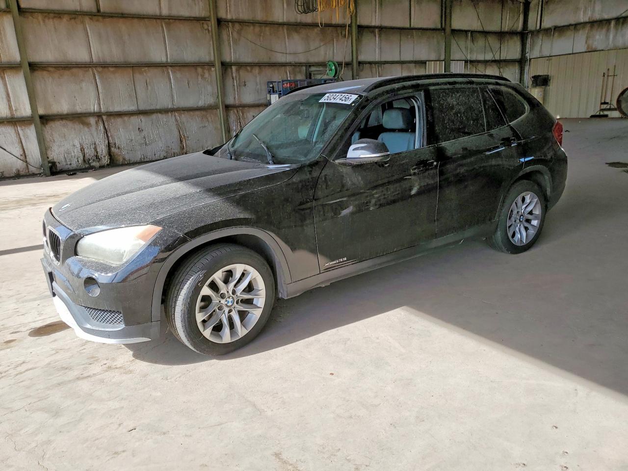 2015 BMW X1 xDrive28i, VIN WBAVL1C5XFVY28818 — Front end