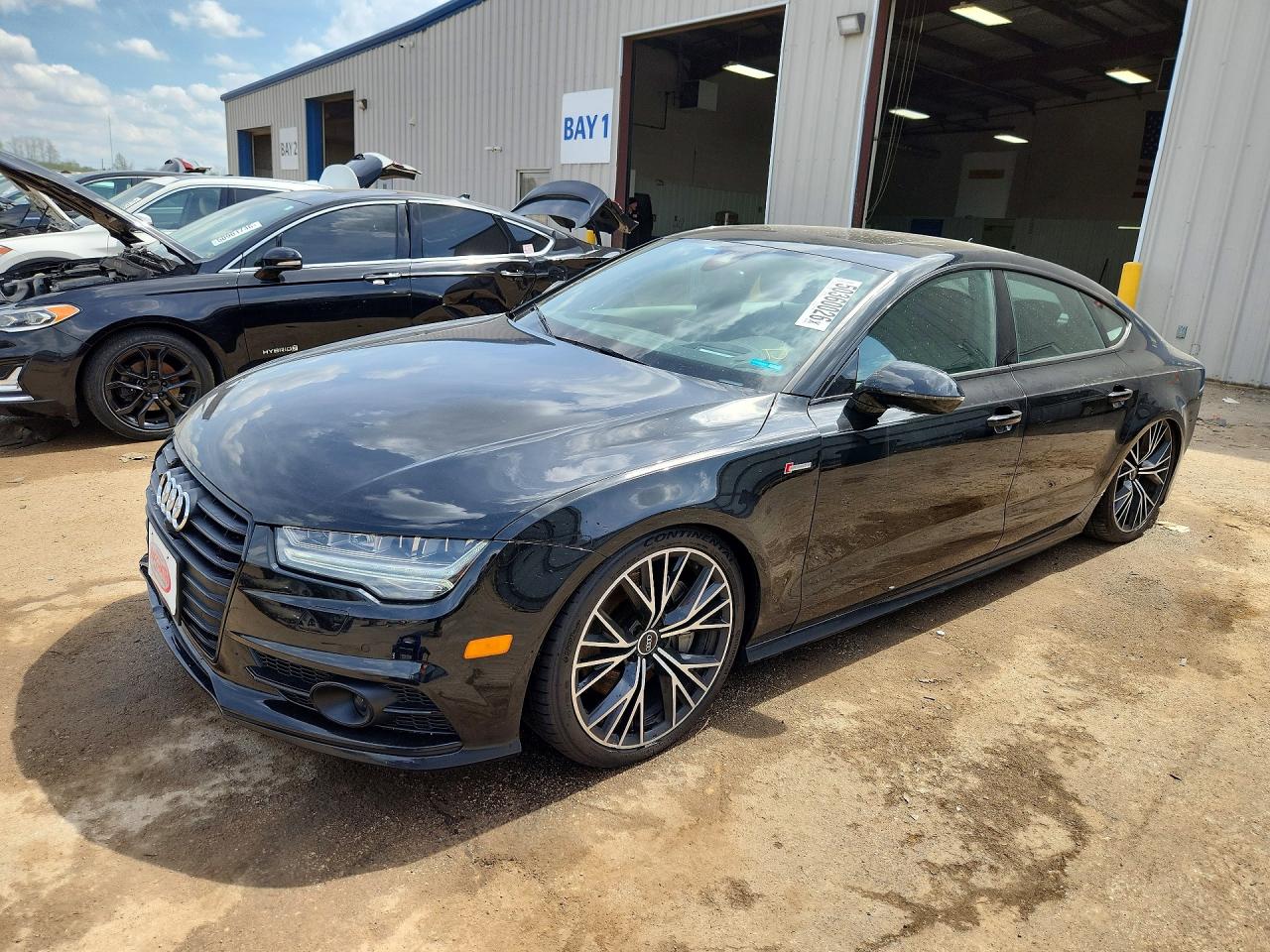 2018 Audi A7 Prestige, VIN WAU23AFC3JN004262 — Rear end