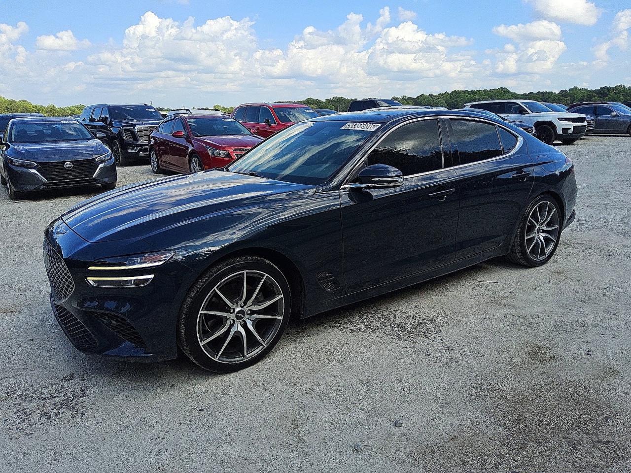 2022 Genesis G70 2.0T, VIN KMTG34TA1NU101437 — Side