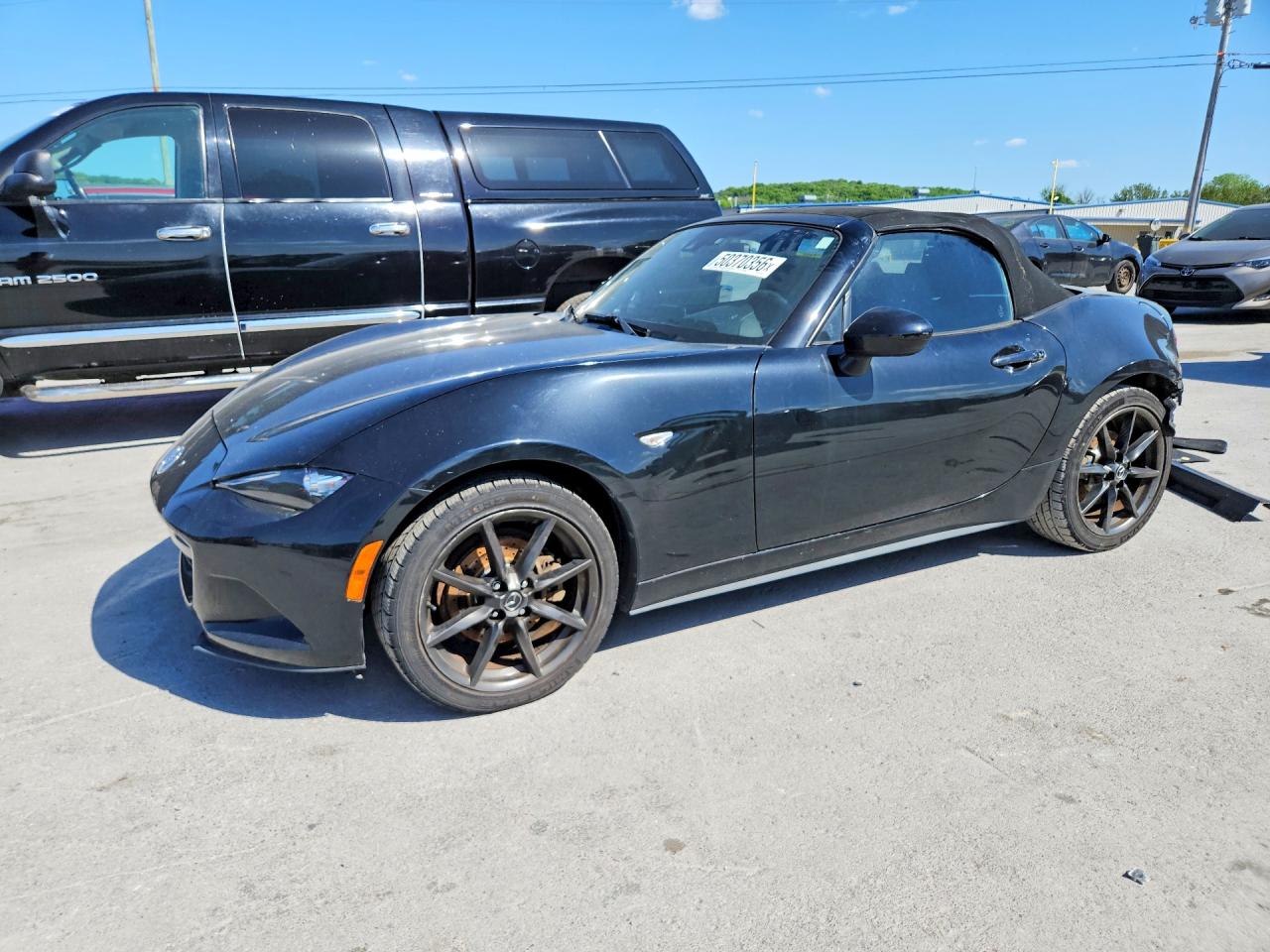 2016 Mazda MX-5 Miata Grand Touring, VIN JM1NDAD72G0104183 — Rear end