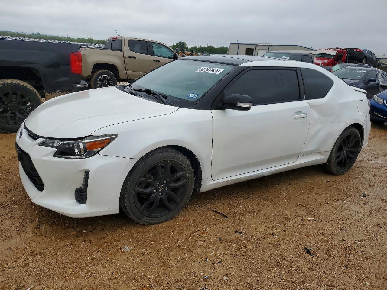 2014 Scion tC 10 Series, VIN JTKJF5C74E3087019 — Side