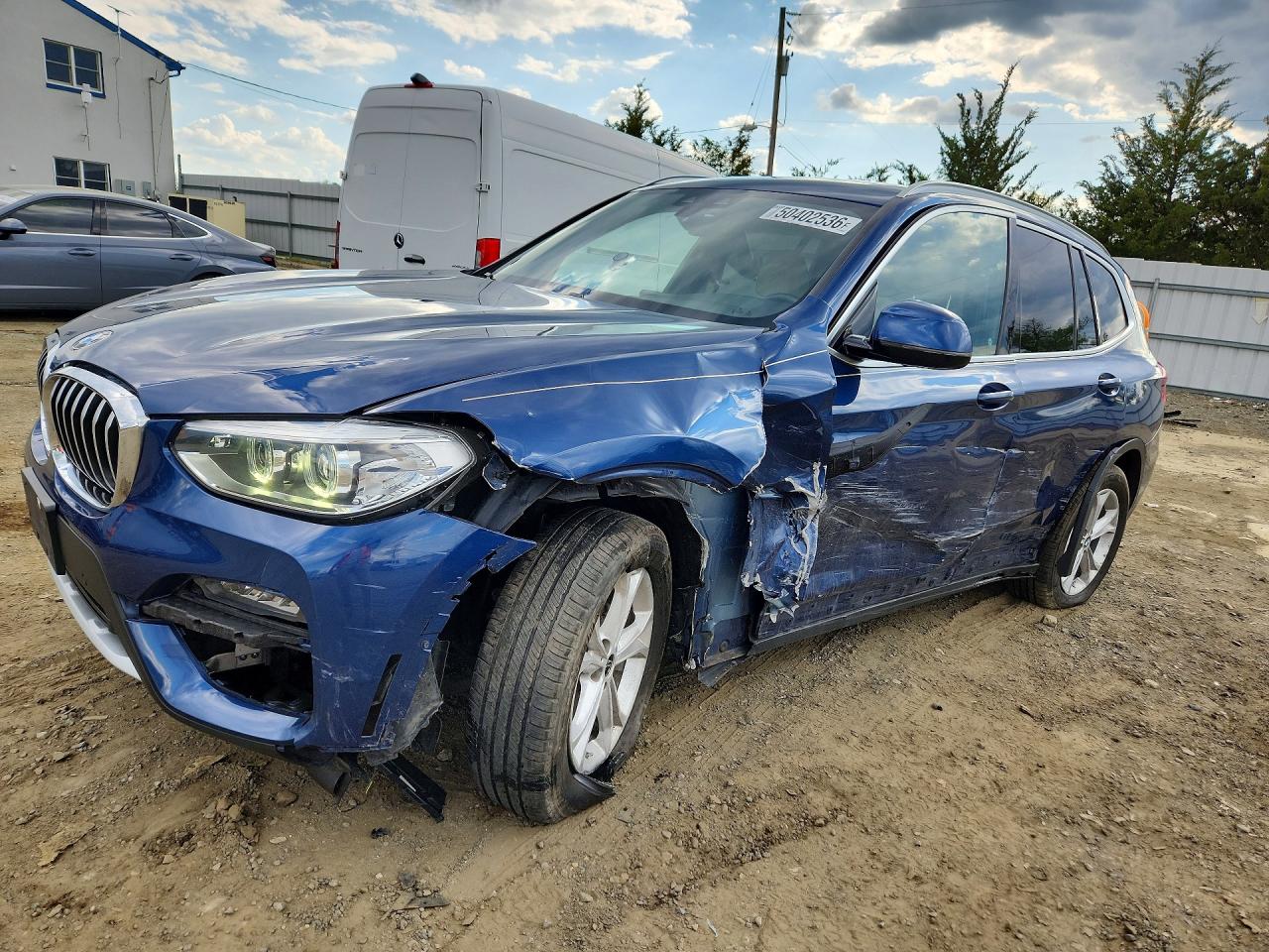 2020 BMW X3 xDrive30i, VIN 5UXTY5C00L9B66583 — Бок