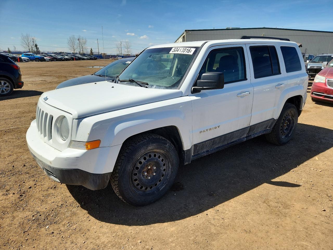 2015 Jeep Patriot North, VIN 1C4NJRAB3FD393873 — Side