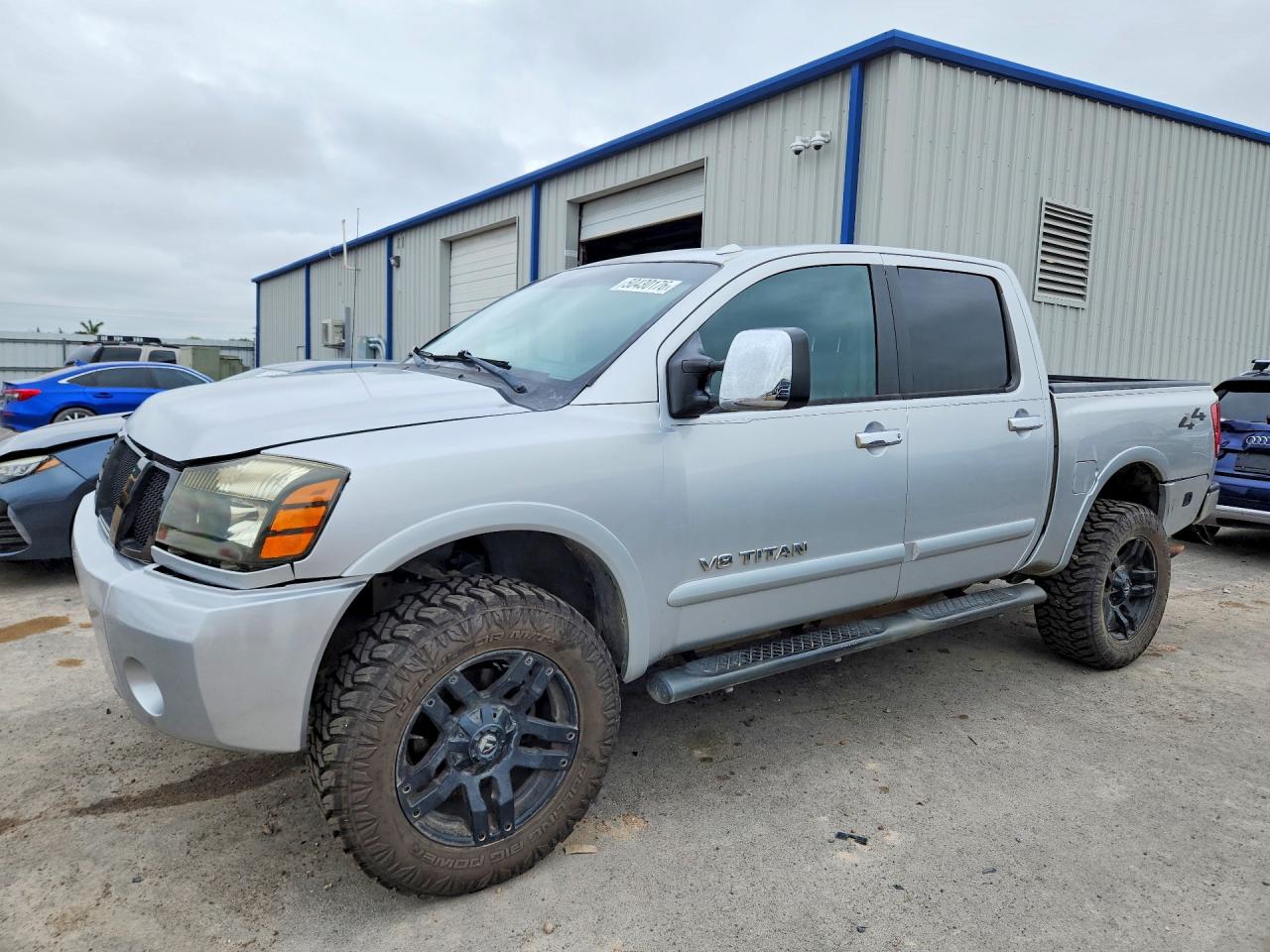 2010 Nissan Titan LE, VIN 1N6BA0EC6AN319431 — Ранее повреждён