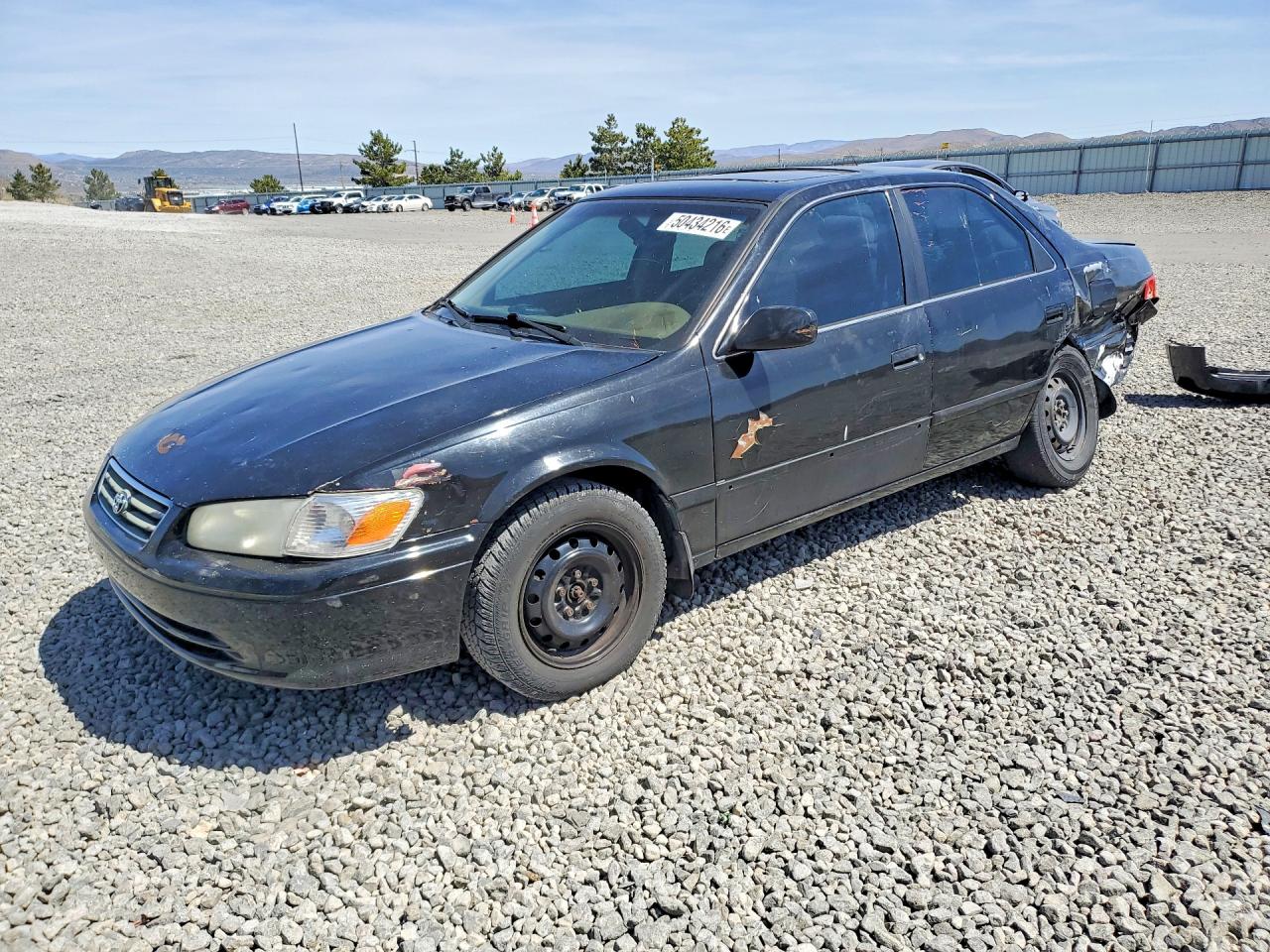 2000 Toyota Camry CE, VIN 4T1BG22K0YU983325 — Side