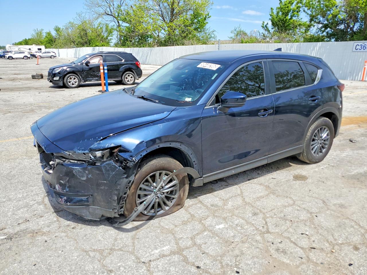 2021 Mazda CX-5 Touring, VIN JM3KFBCM6M0497473 — Front end