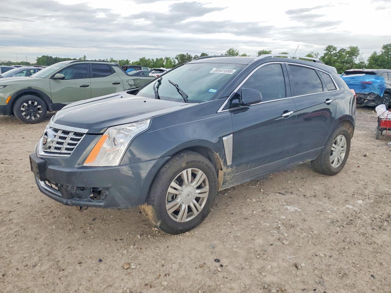 2016 Cadillac SRX Luxury Collection, VIN 3GYFNBE3XGS553634 — Front end