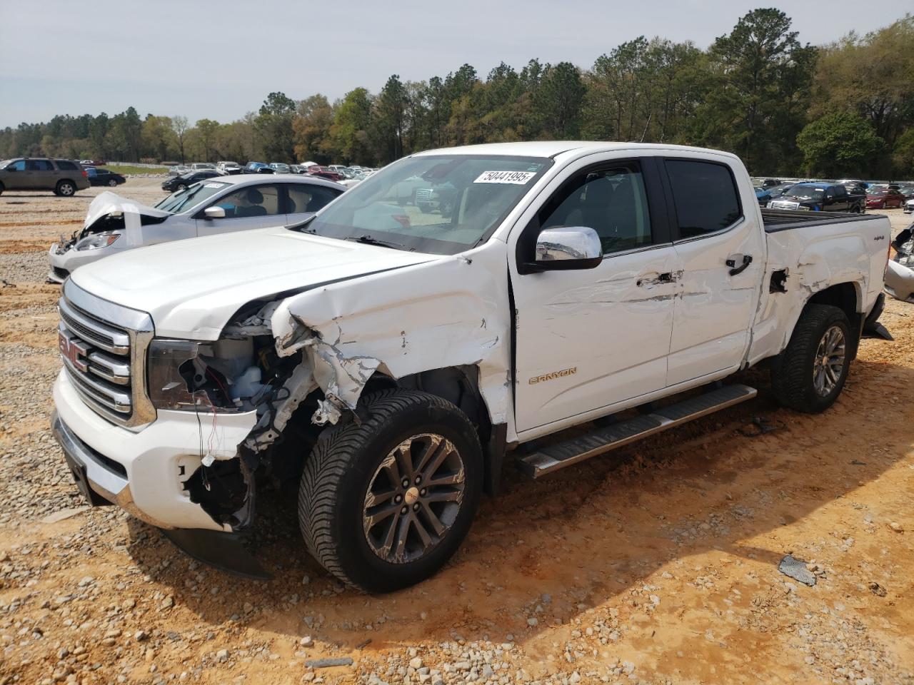 2017 GMC Canyon 4WD SLT, VIN 1GTG6DEN1H1311371 — Side