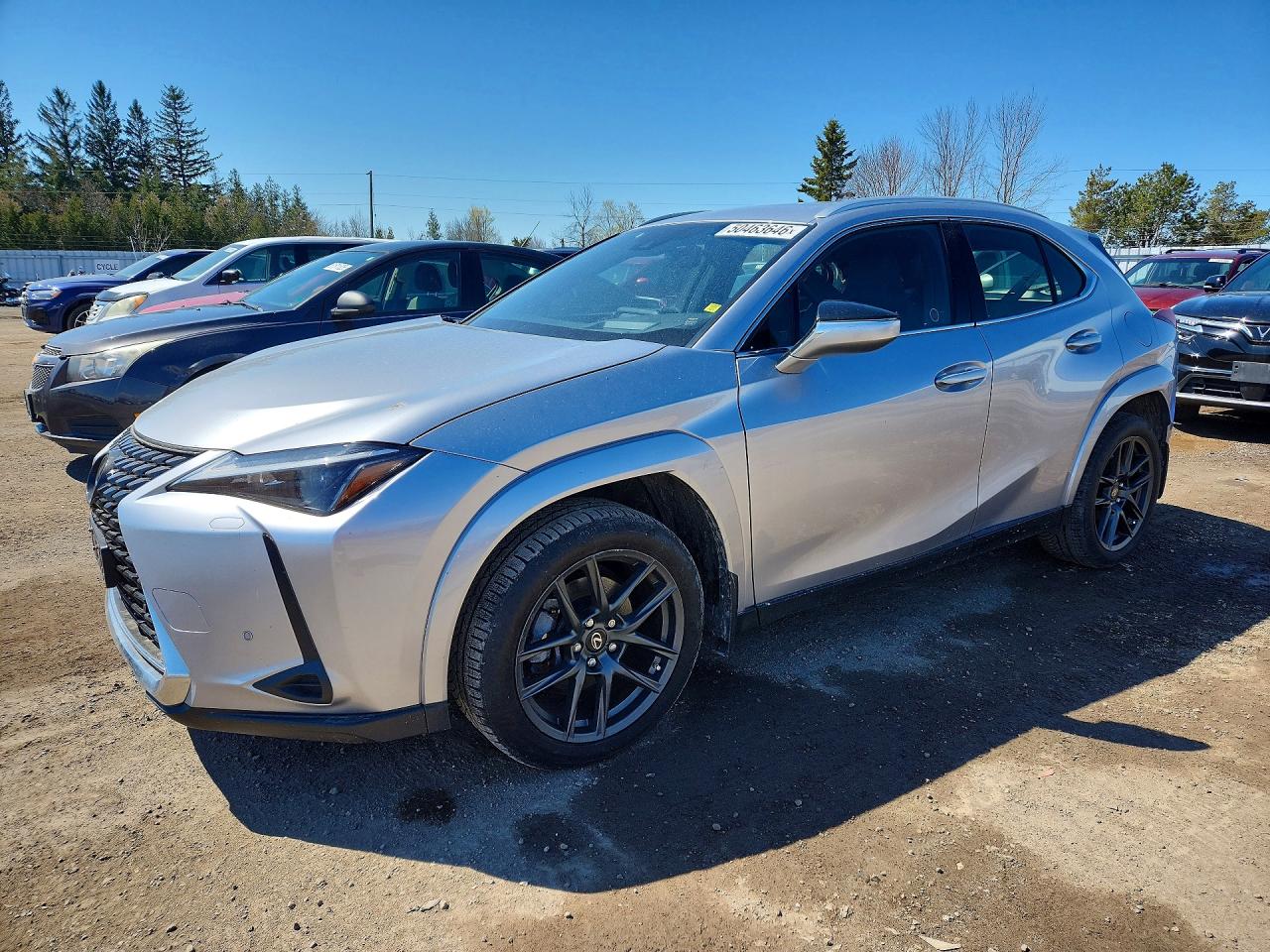 2024 Lexus UX 250h Luxury, VIN JTHL9JBHXR2077261 — Бок