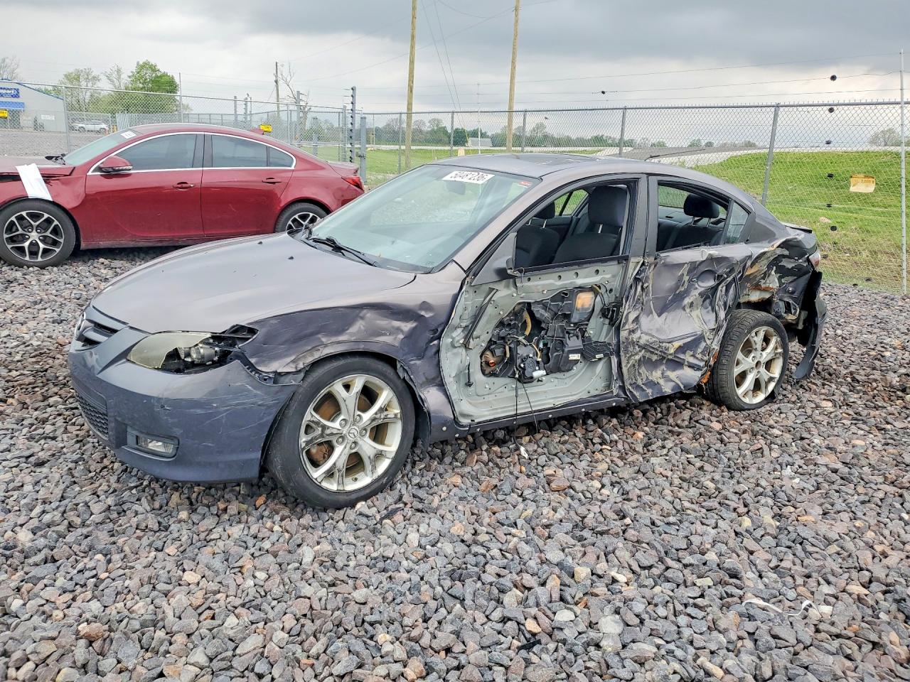 2007 Mazda 3 S Grand Touring, VIN JM1BK323071724335 — Side