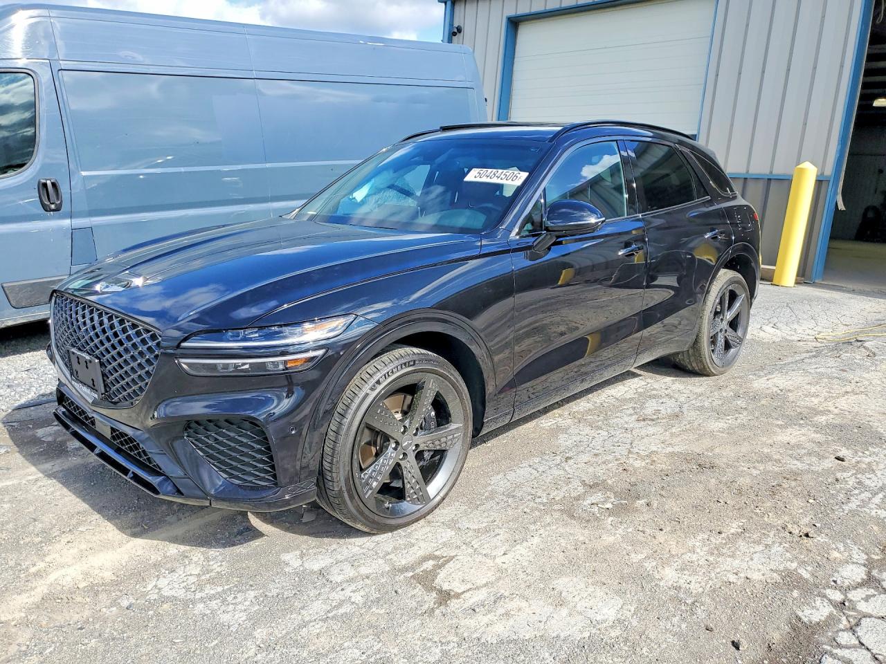 2023 Genesis GV70 2.5T, VIN KMUMADTB2PU115783 — Side