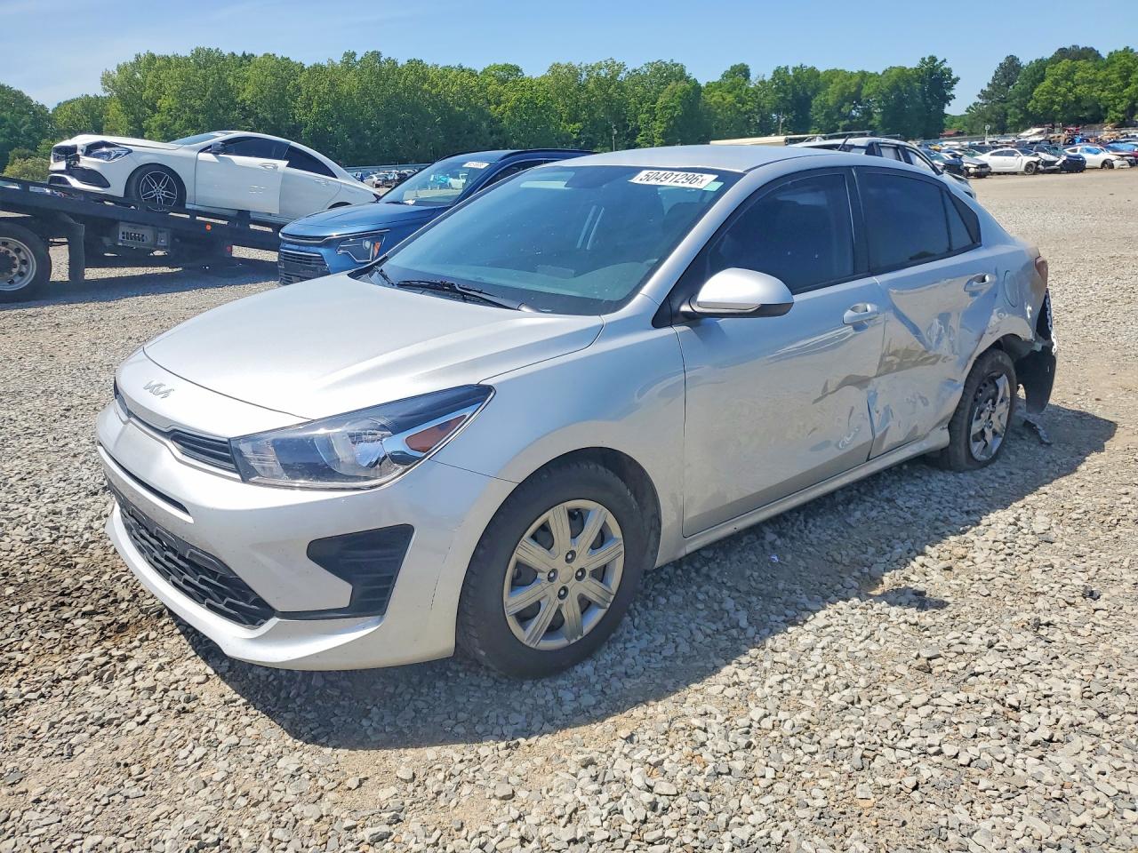 2023 Kia Rio S, VIN 3KPA24AD5PE578099 — Side