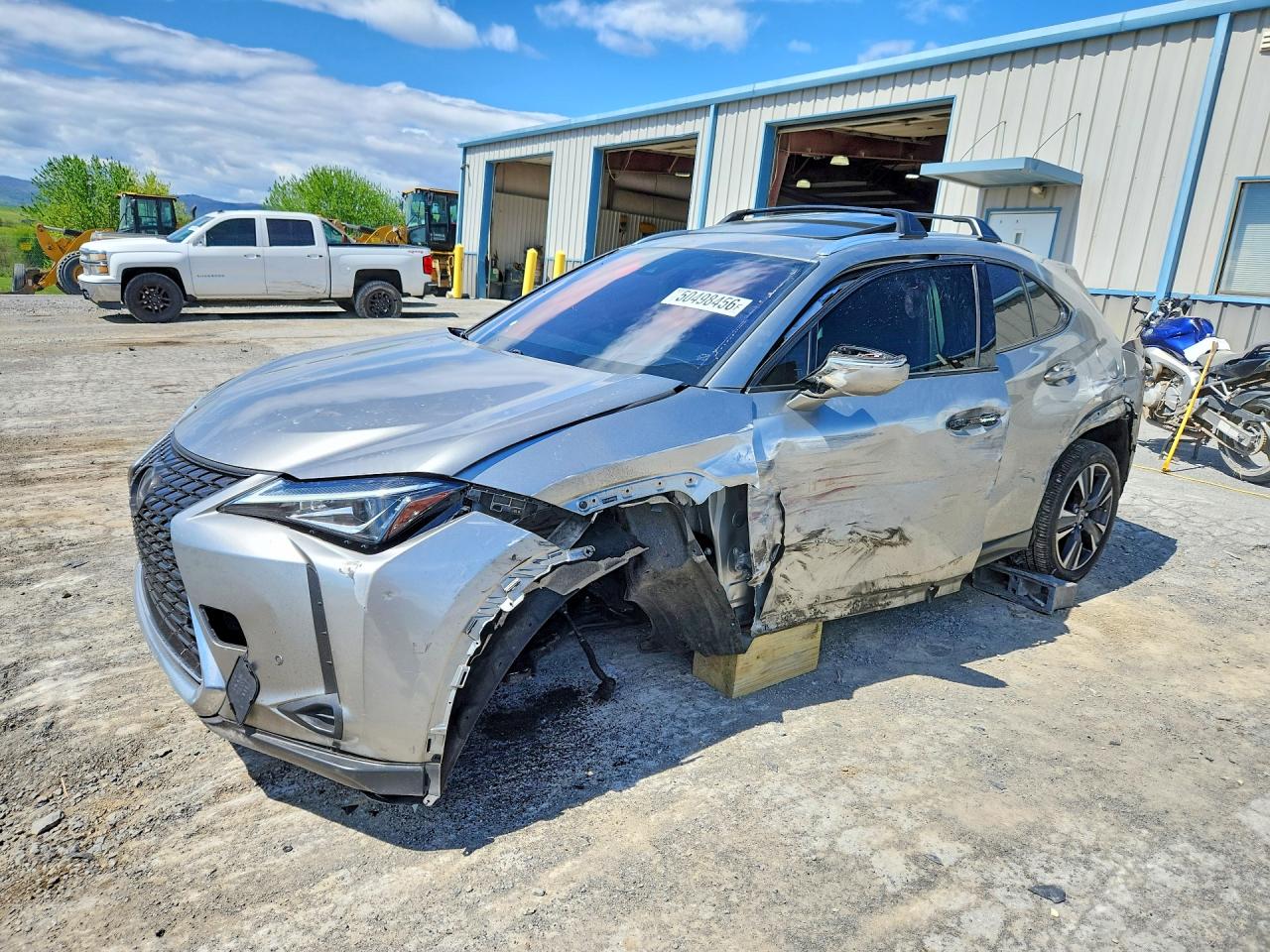 2021 Lexus UX 250h, VIN JTHP9JBH5M2053590 — Front end