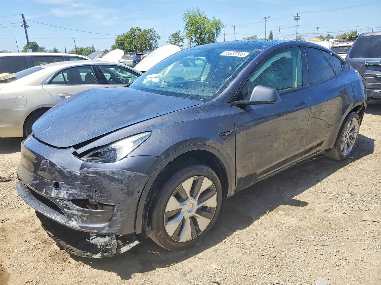 2021 Tesla Model Y Long Range, VIN 5YJYGAEE3MF234276 — Front end
