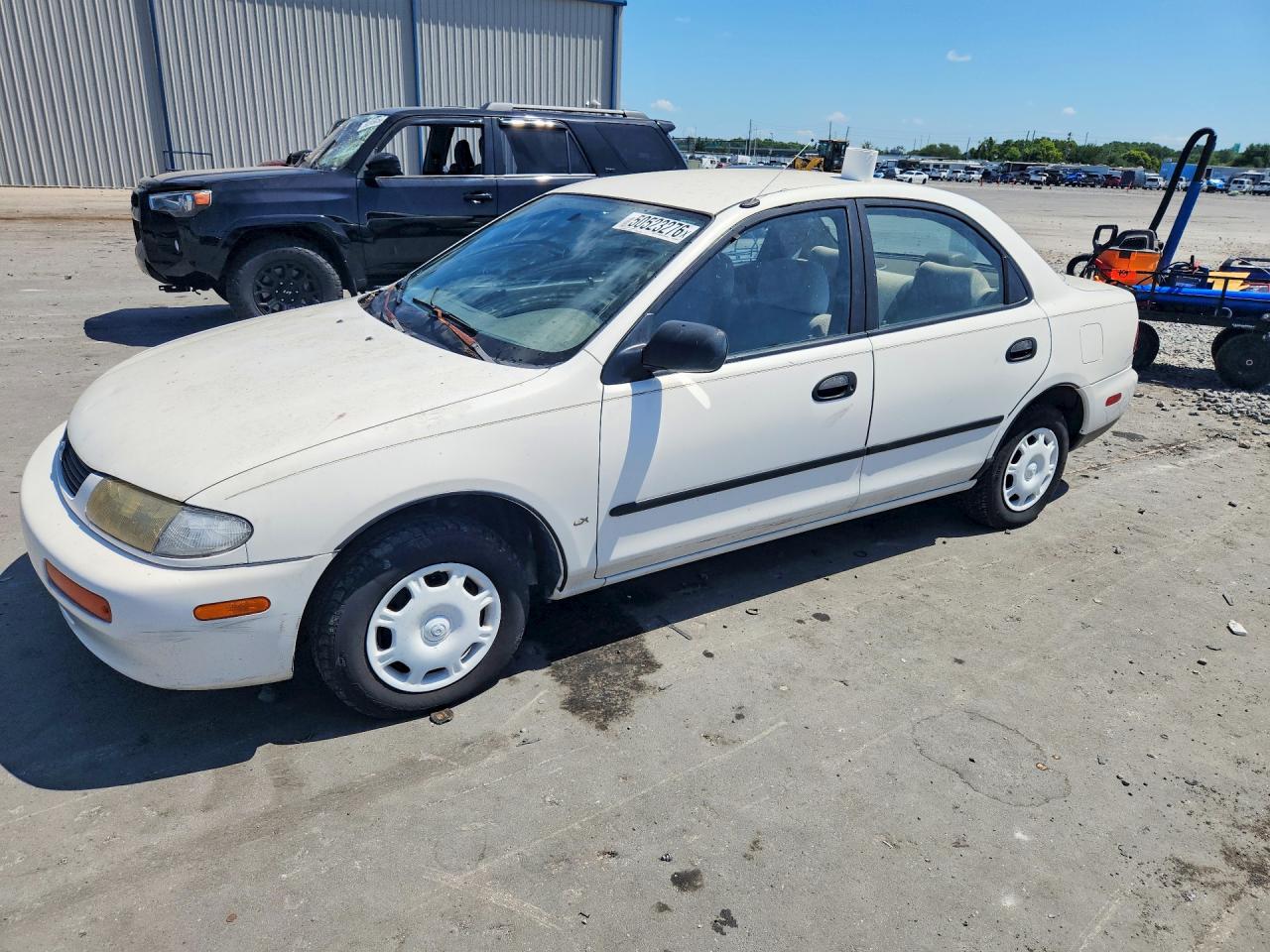 1996 Mazda Protege DX, VIN JM1BB1418T0301499 — Мелкие вмятины и царапины