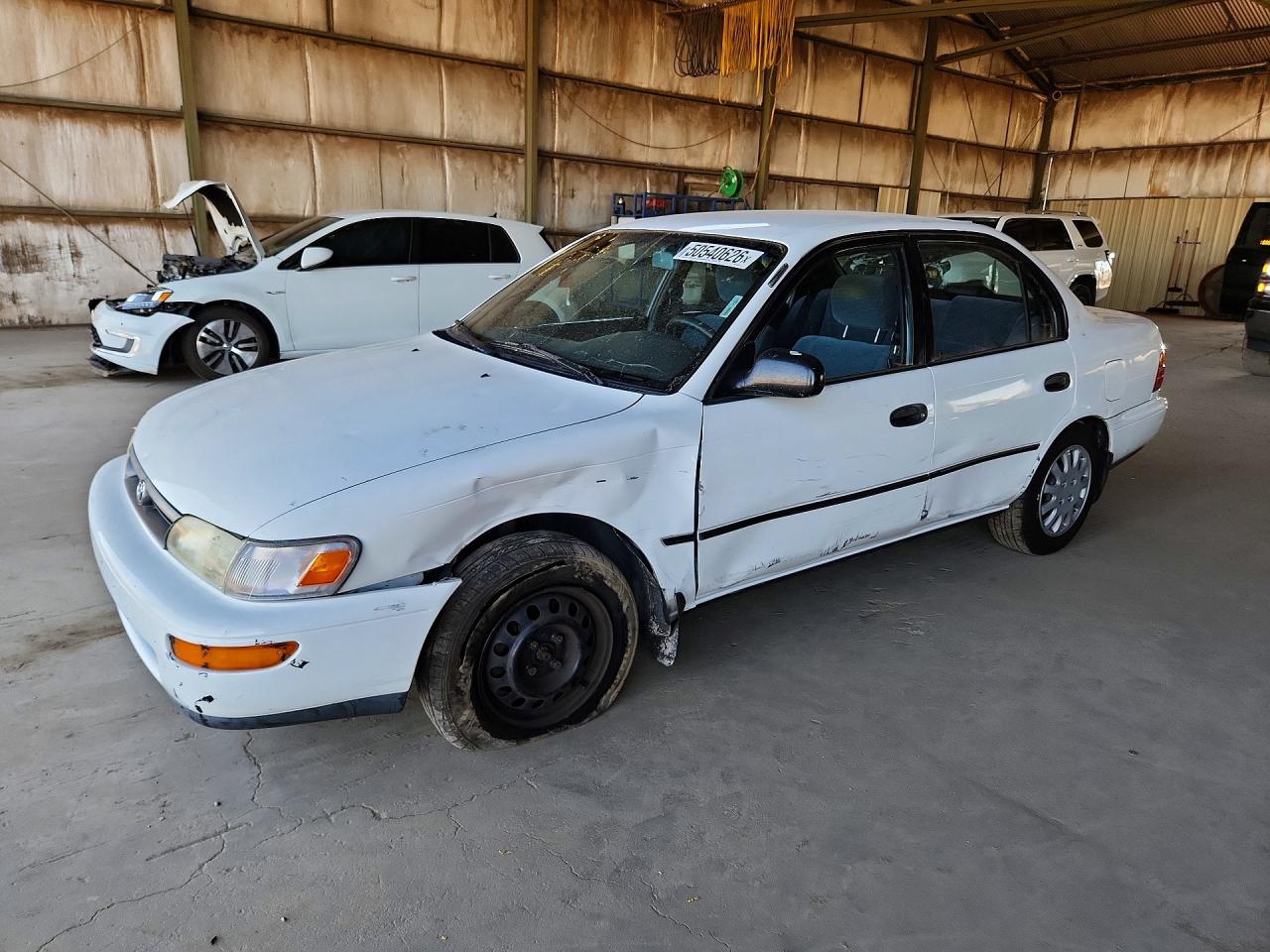 1995 Toyota Corolla DX, VIN 1NXAE09B0SZ312417 — Front end