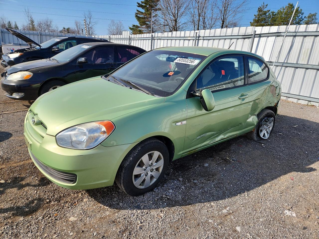 2010 Hyundai Accent L, VIN KMHCN3BC1AU164421 — Side