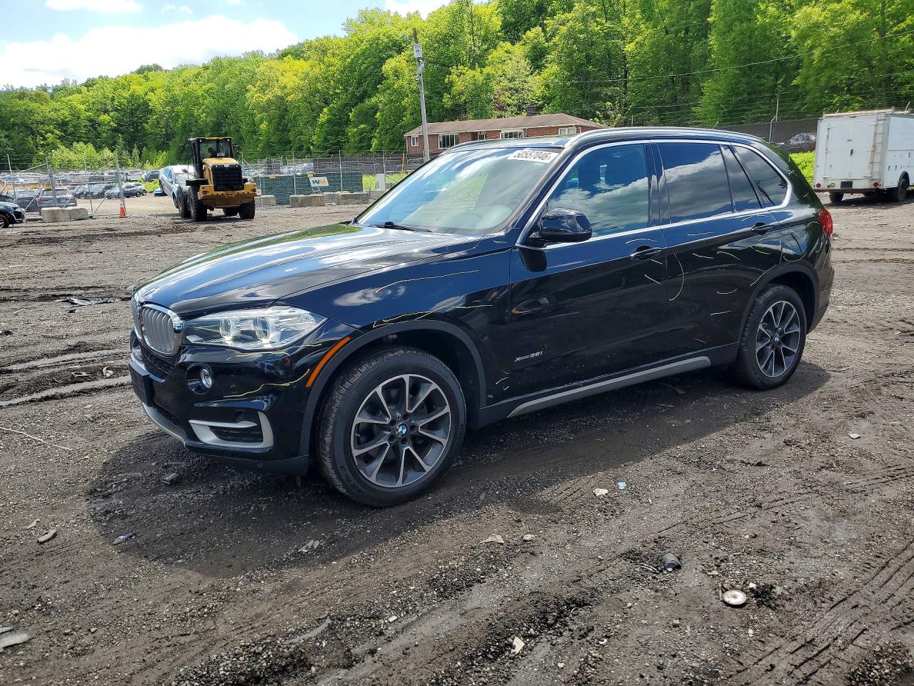 2018 BMW X5 xDrive35i, VIN 5UXKR0C5XJ0Y06689 — Side