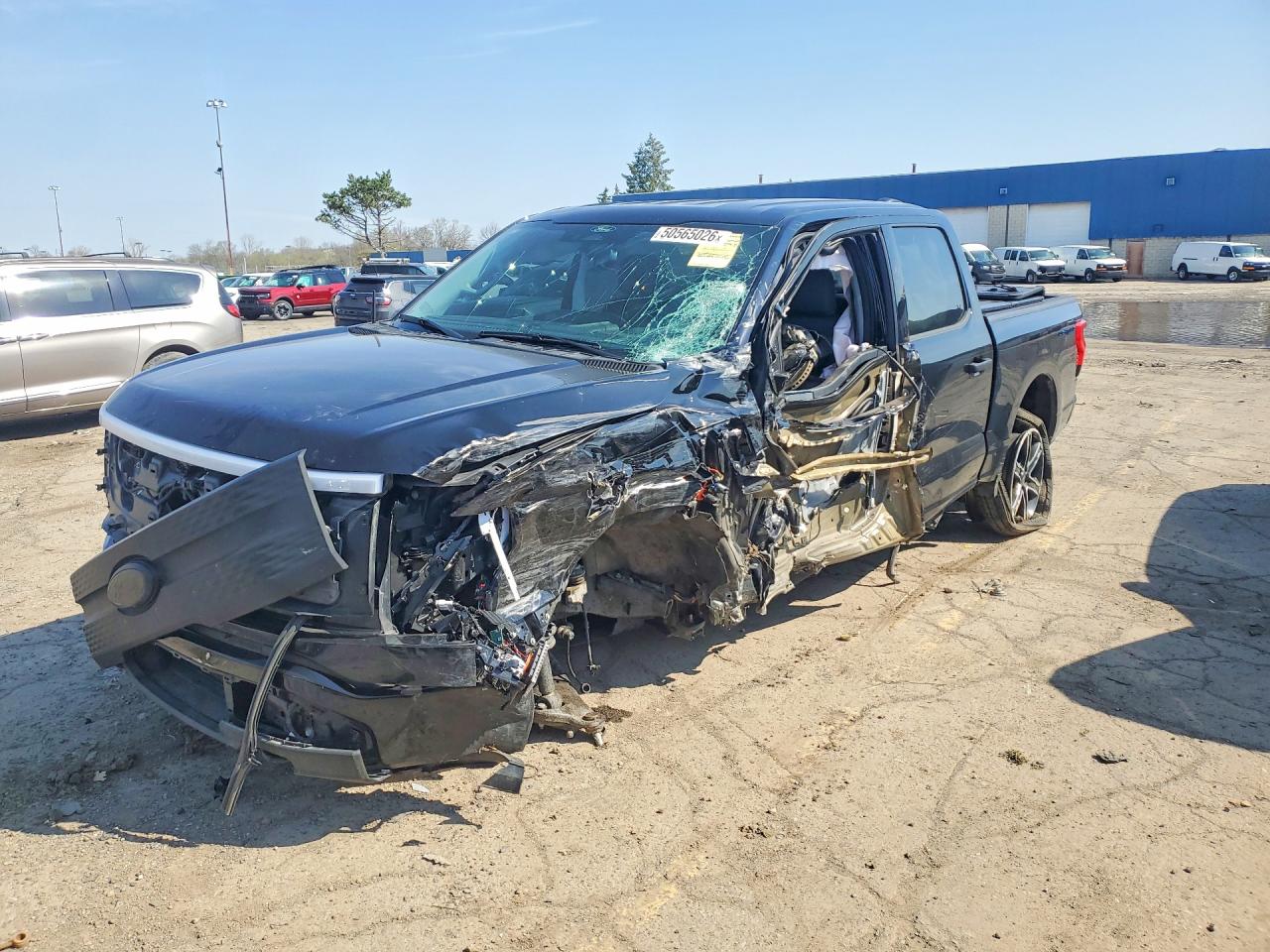 2025 Ford F-150 Lightning XLT, VIN 1FTVW3LK5SWG16375 — Side
