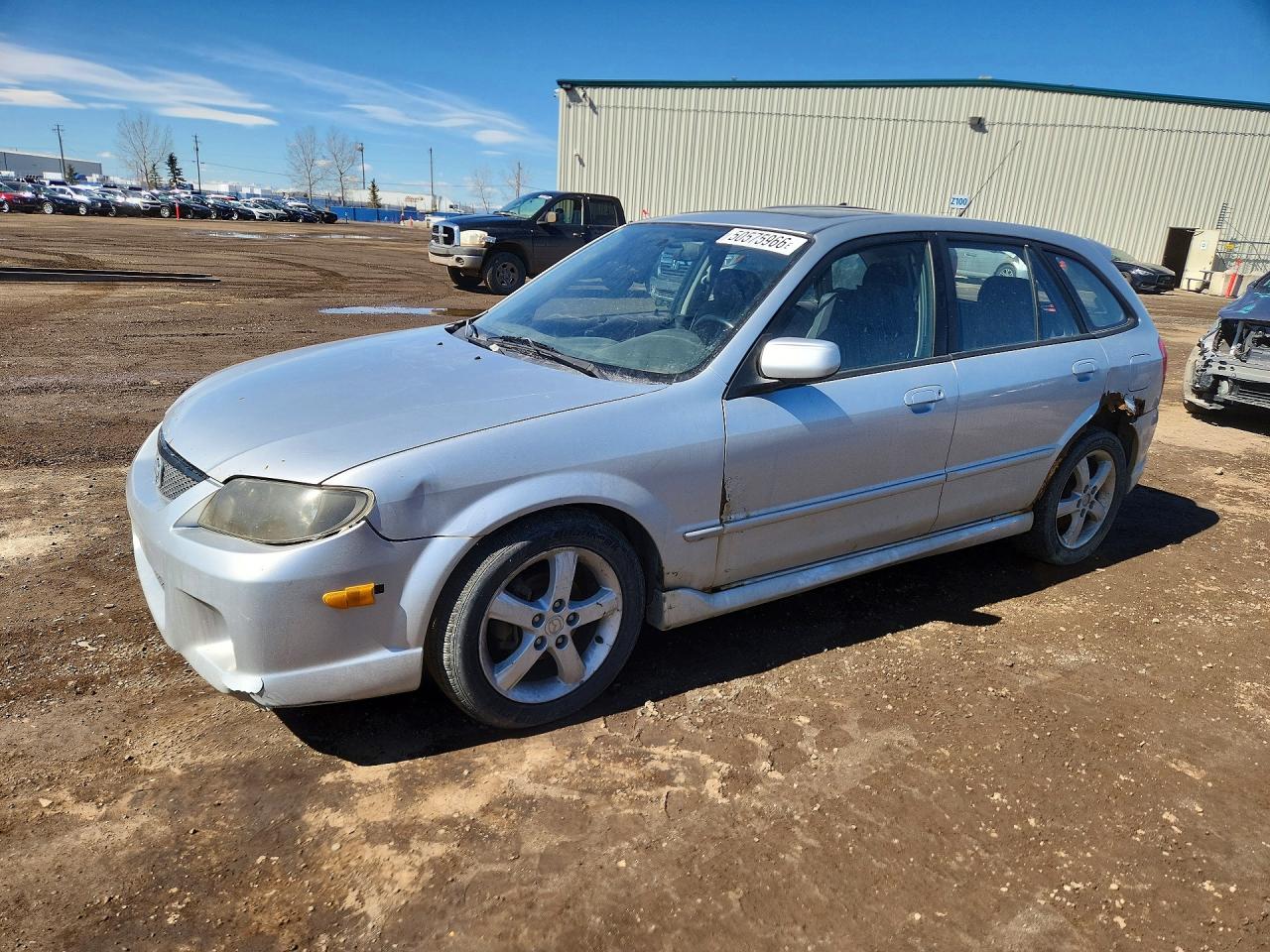 2003 Mazda Protege, VIN JM1BJ245931103326 — Град