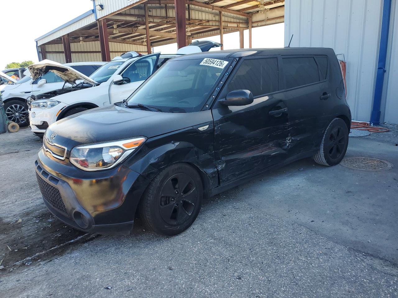 2014 Kia Soul, VIN KNDJN2A25E7085322 — Side