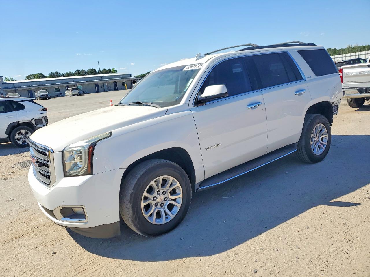 2015 GMC Yukon SLE, VIN 1GKS1AKC7FR666154 — Frame damage
