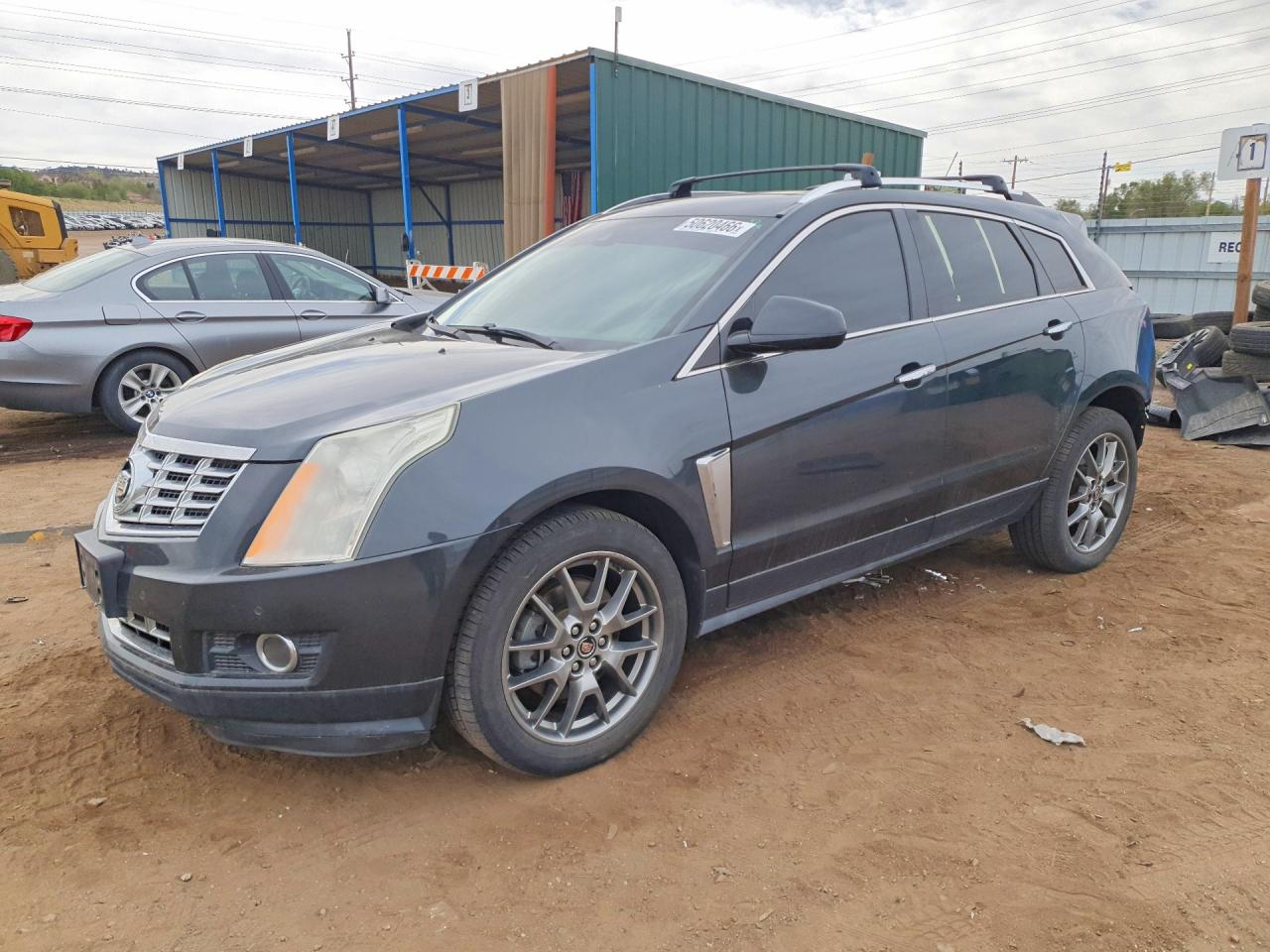 2015 Cadillac SRX Premium Collection, VIN 3GYFNGE3XFS556349 — Rear end
