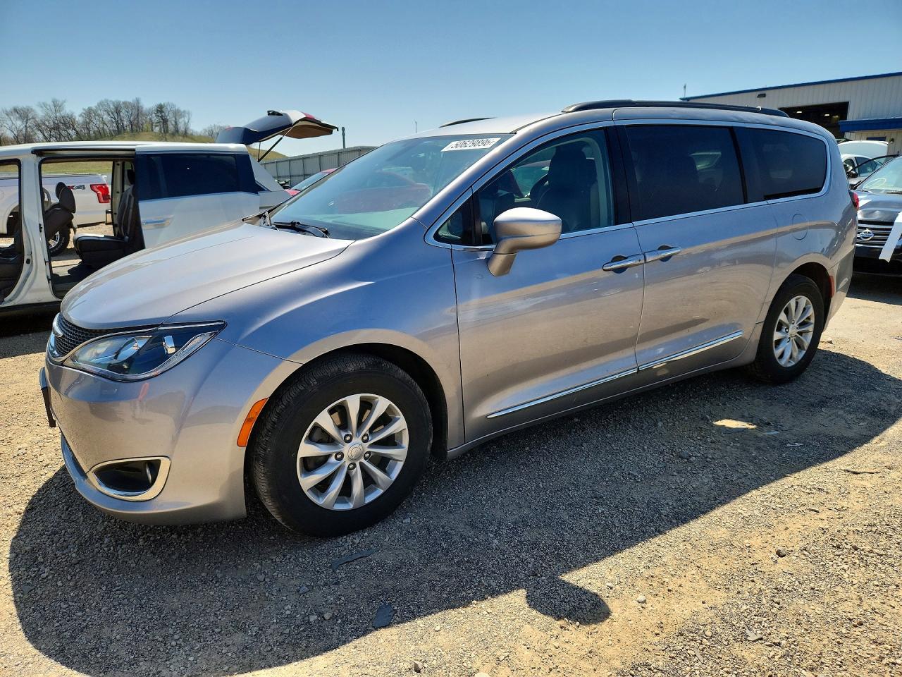 2017 Chrysler Pacifica Touring L, VIN 2C4RC1BGXHR627434 — Hail