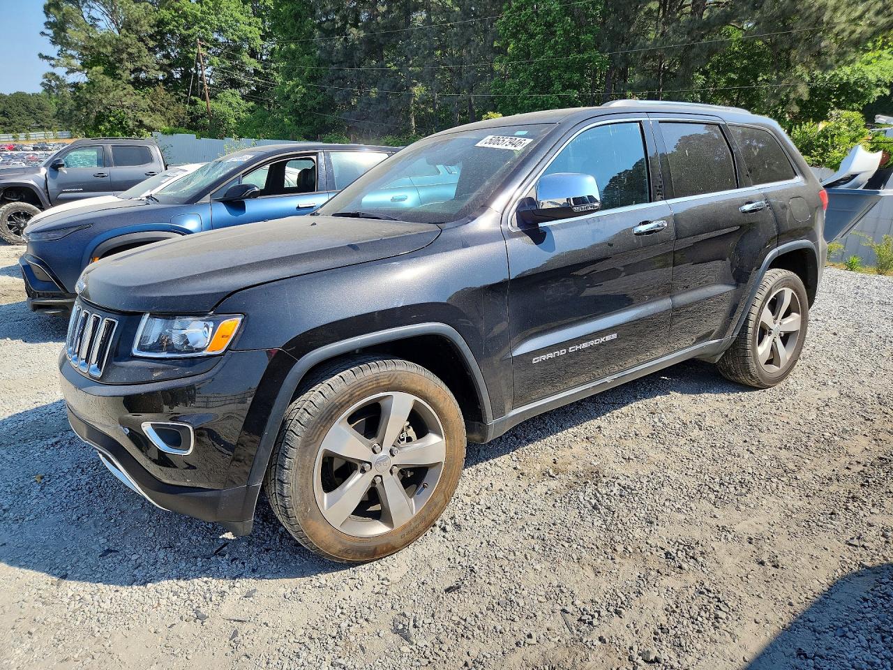 2016 Jeep Grand Cherokee Limited, VIN 1C4RJEBG8GC320655 — Side