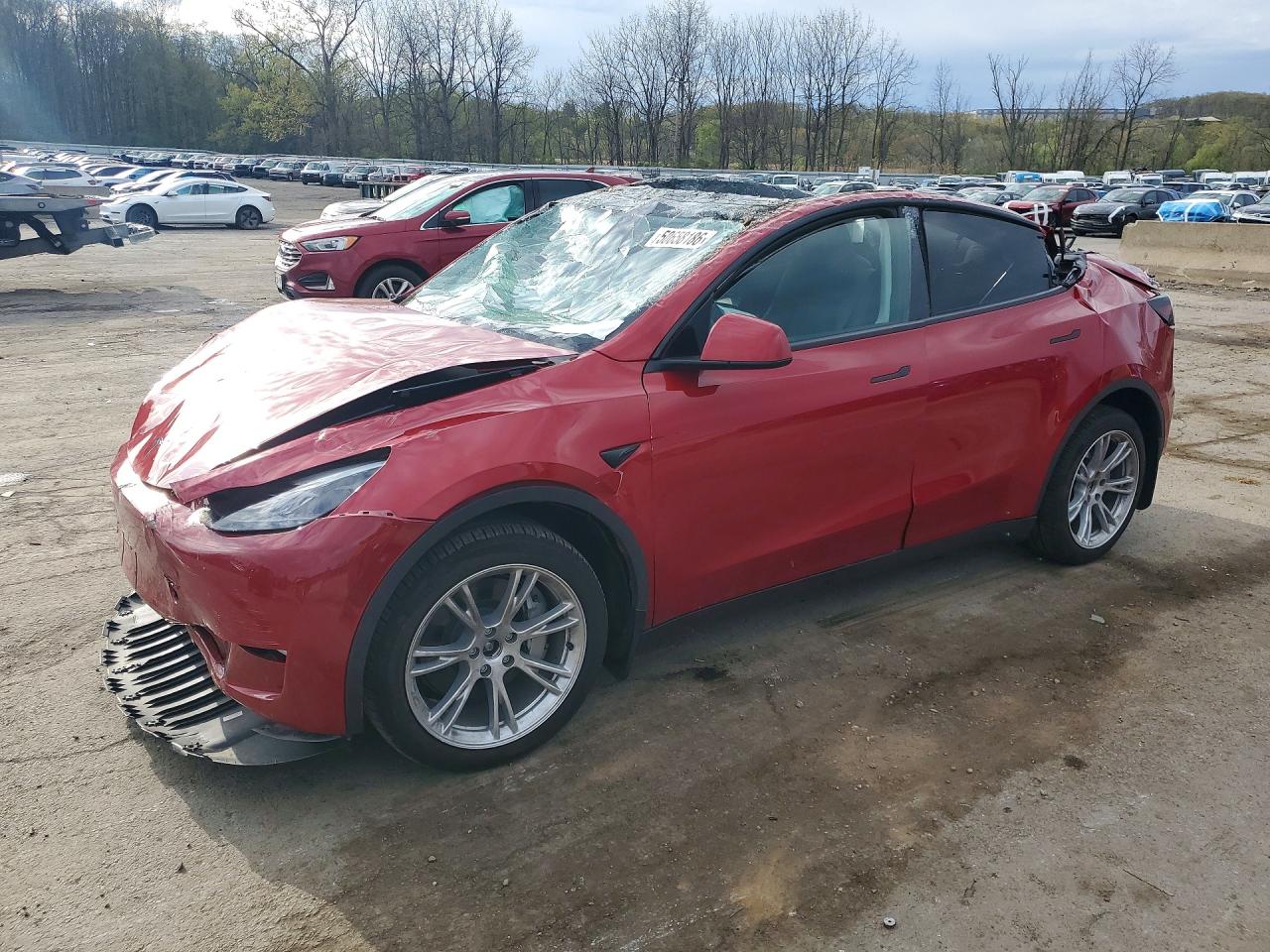 2023 Tesla Model Y Long Range, VIN 7SAYGDEE2PA203851 — Rollover