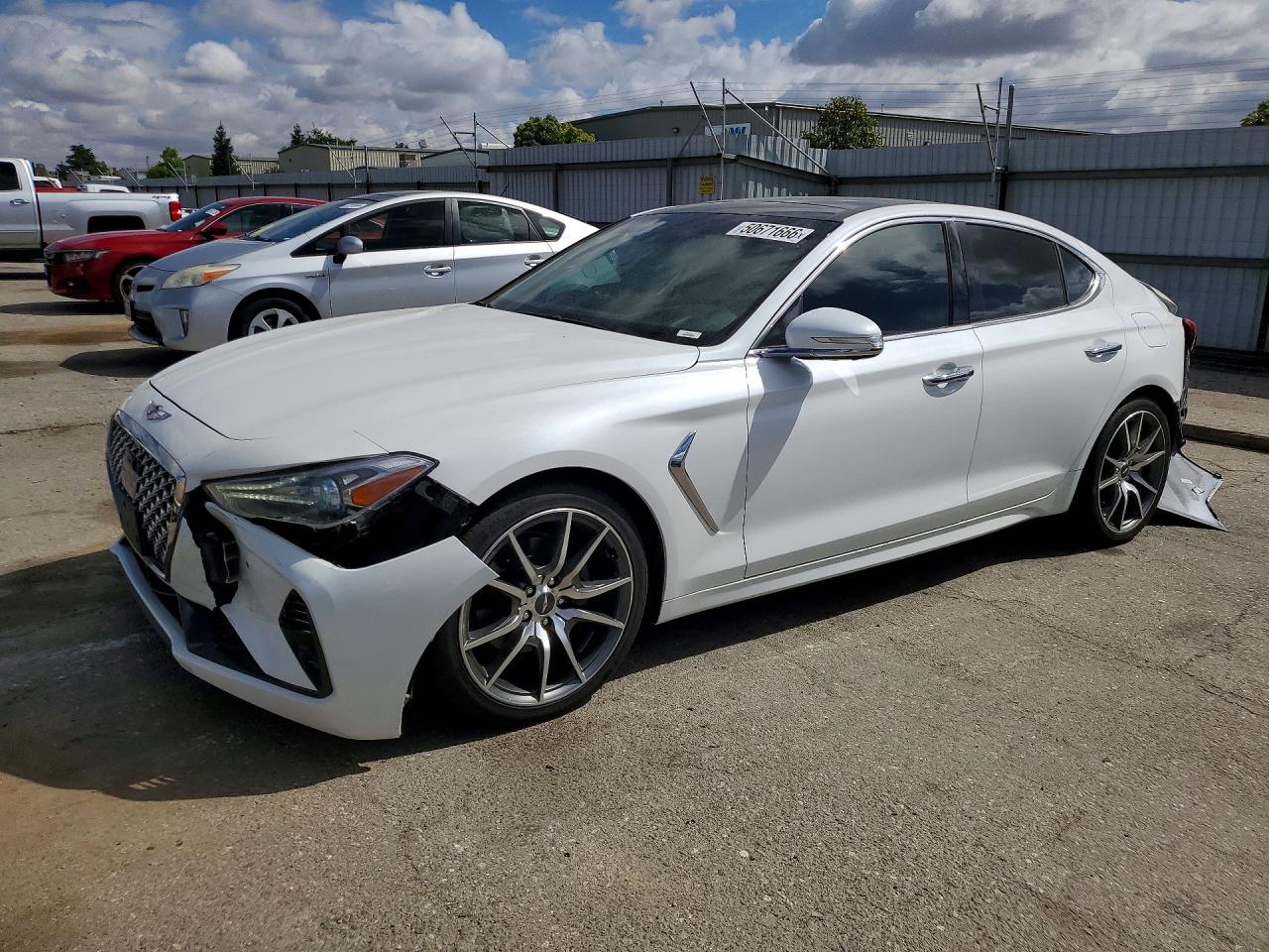 2021 Genesis G70 2.0T, VIN KMTG44LA3MU067092 — Rear end