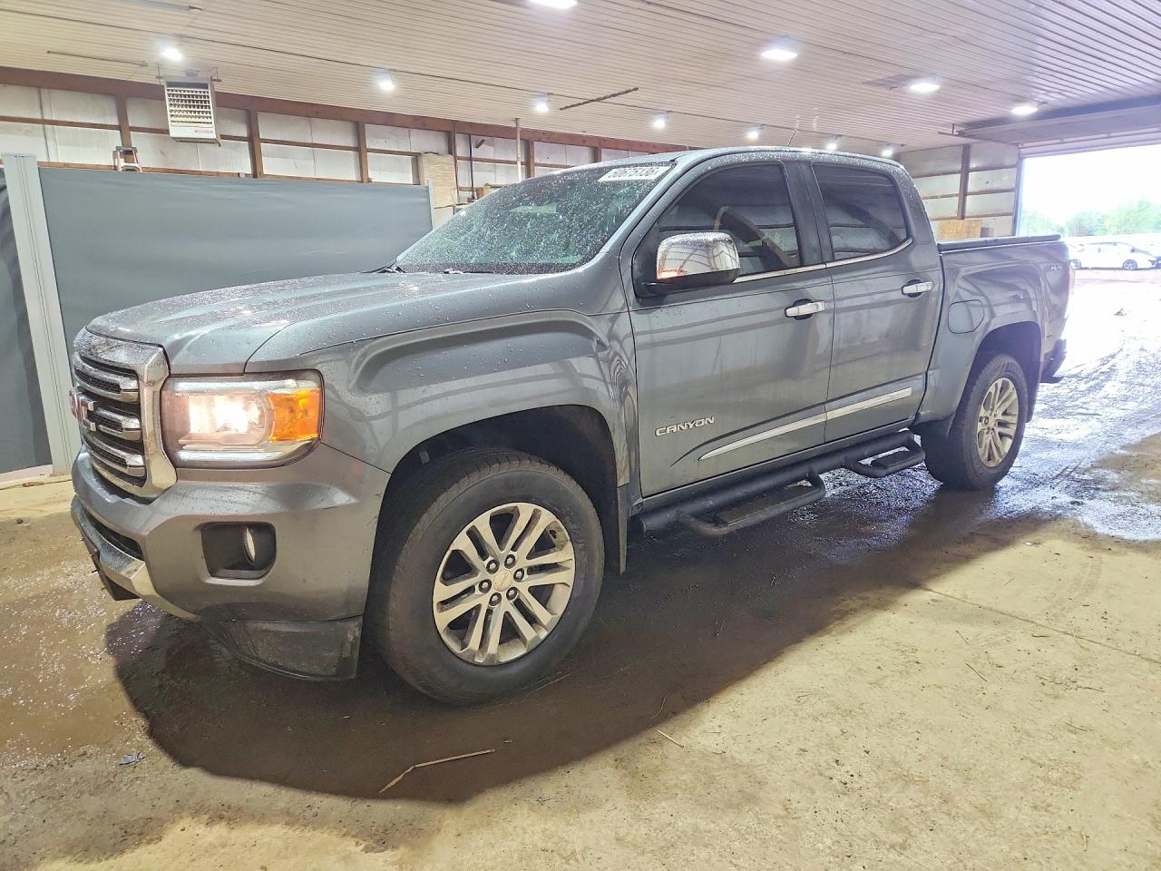 2018 GMC Canyon 4WD SLT, VIN 1GTG6DEN0J1216693 — Hail