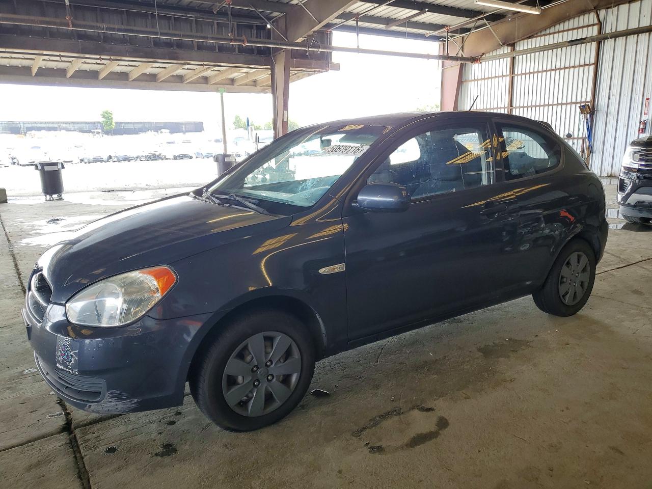 2010 Hyundai Accent GS, VIN KMHCM3AC4AU162232 — Side